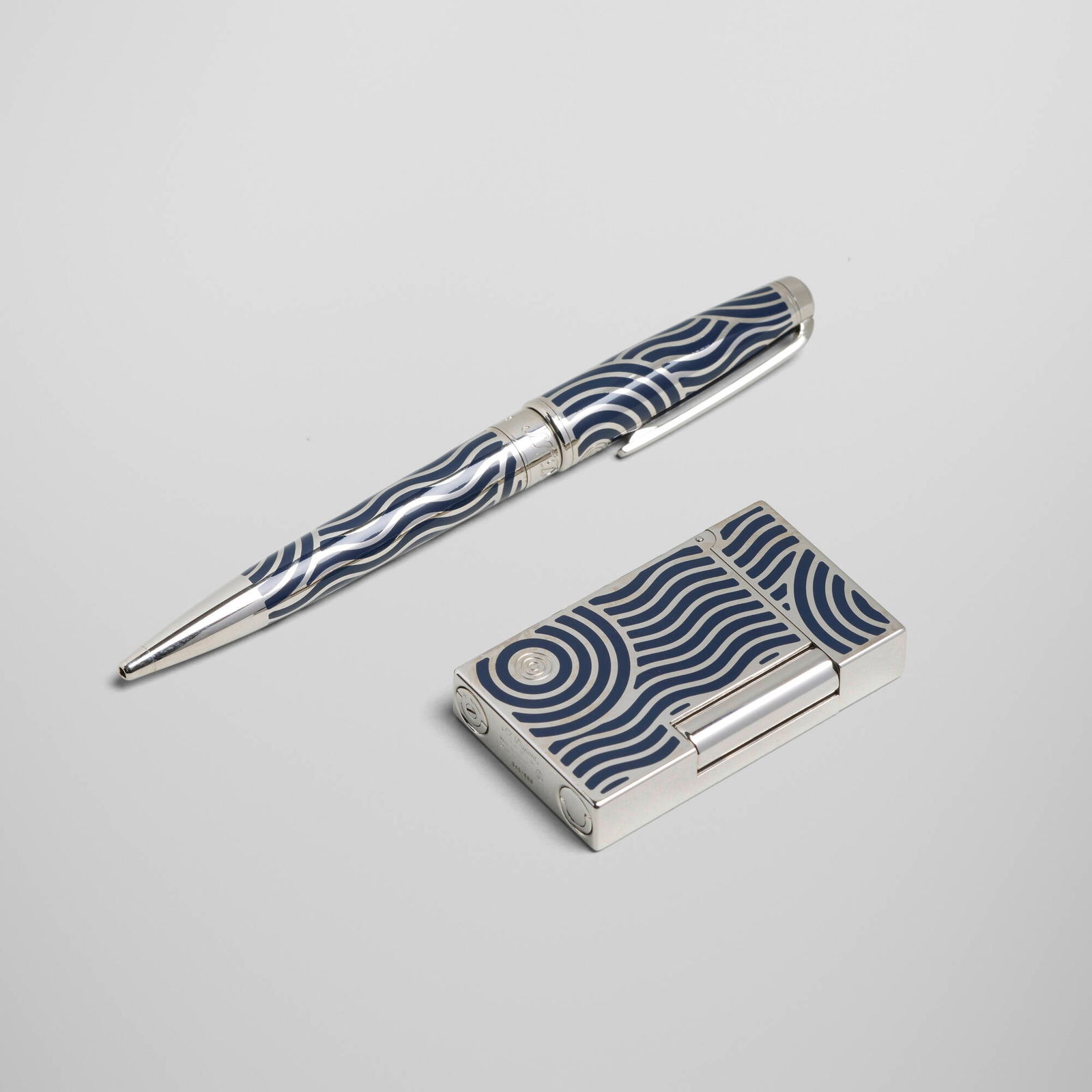 S.T. Dupont, Neptune Olympio pocket lighter and ballpoint pen: S.T. Dupont Neptune Olympio pocket lighter and ballpoint pen France, 2010lacquer, silver-plated metal lighter: 2.375 h x 1.5 w x 0.375 d in (6 x 4 x 1 cm) pen: 5.375 h x 0.625 w x 0.5 d in (14 x 2