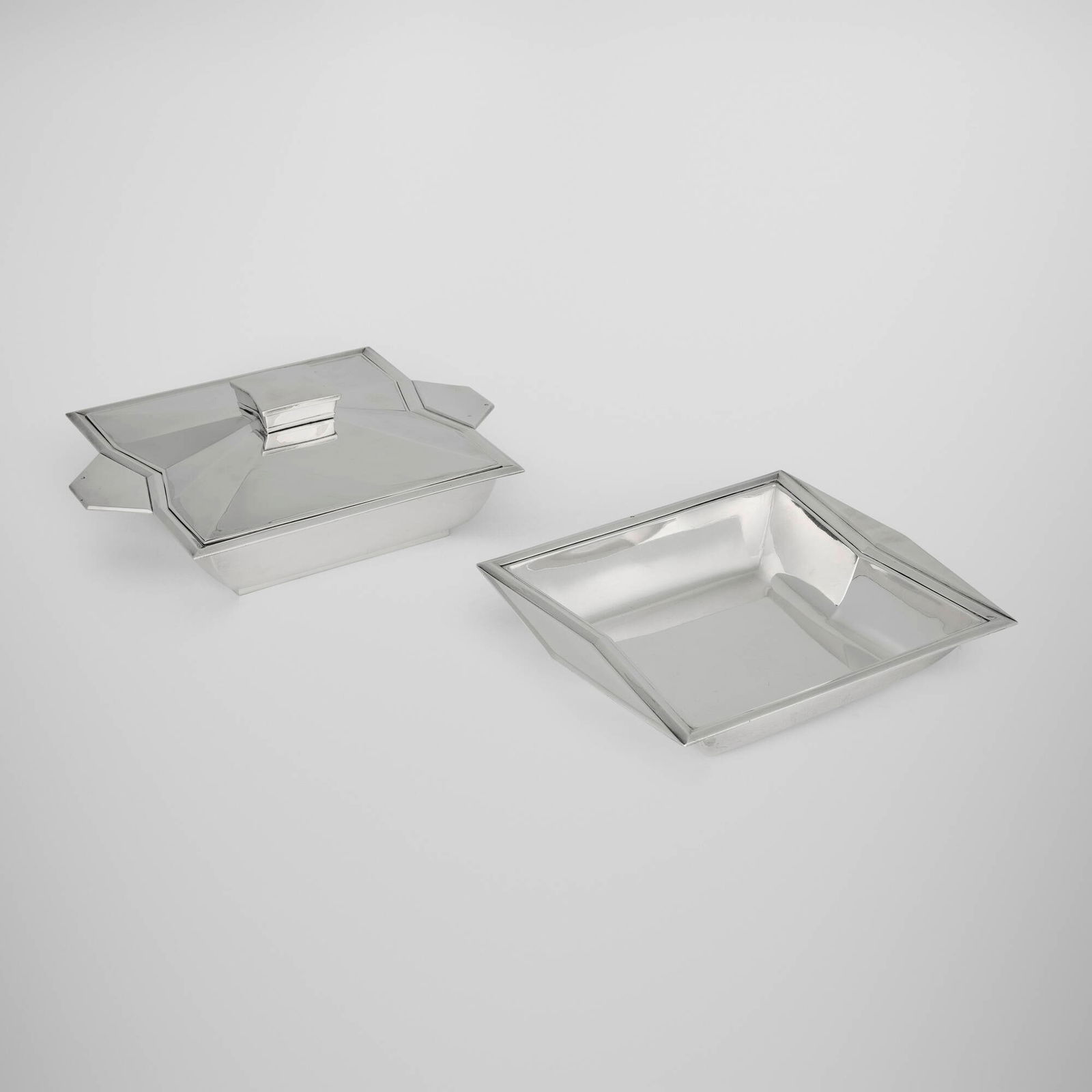 Henin & Cie, Tray and covered dish: Henin & Cie Tray and covered dish France, c. 1930.950 silver 4 h x 11 w x 8.5 d in (10 x 28 x 22 cm) 1.75 h x 9.75 w x 8.5 d in (4 x 25 x 22 cm) Impressed maker's mark and French hallmark t