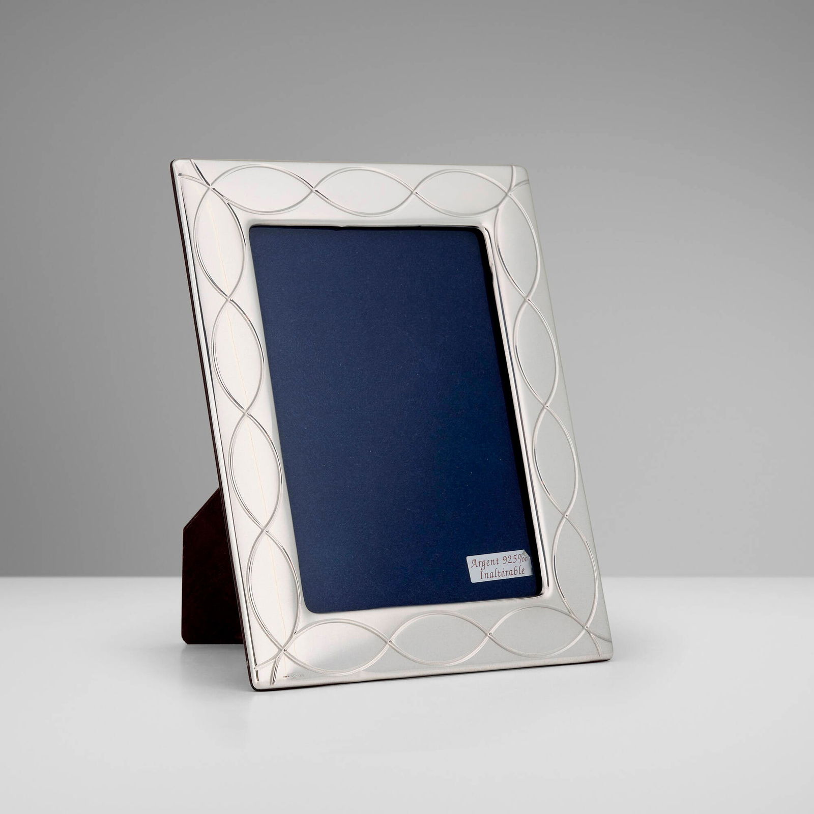 Christian Dior, Picture frame: Christian Dior Picture frame France/Italy, c. 2000sterling silver, mahogany, glass 8.875 h x 7.25 w x 6 d in (23 x 18 x 15 cm) Impressed manufacturer's mark and touchmarks to lower edge and to