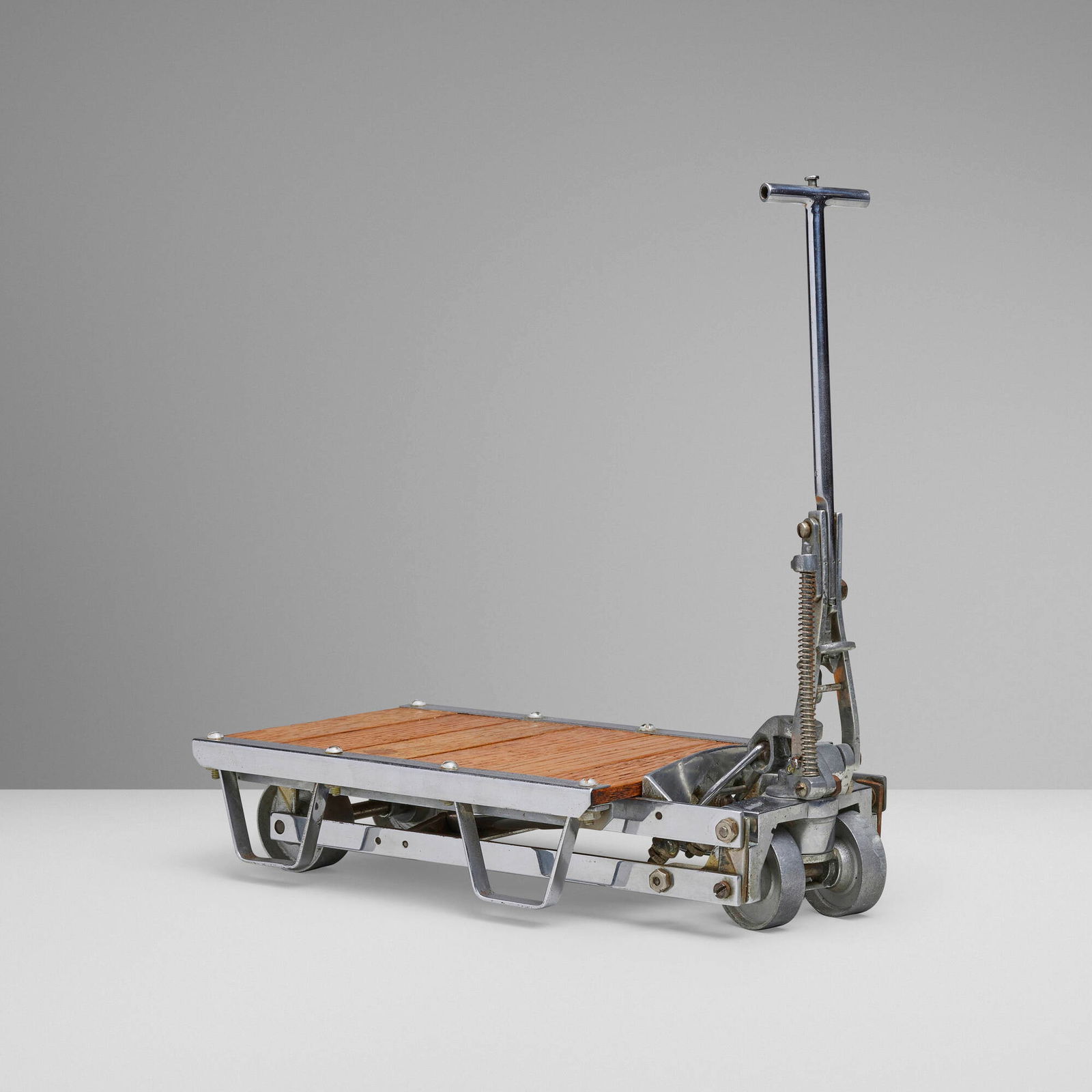 Articulated salesman's sample industrial cart: Articulated salesman's sample industrial cart 20th centurychrome-plated steel, cast metal, oak 12.5 h x 6.25 w x 13 d in (32 x 16 x 33 cm) Cart features a fully functioning mechanism that raises and l
