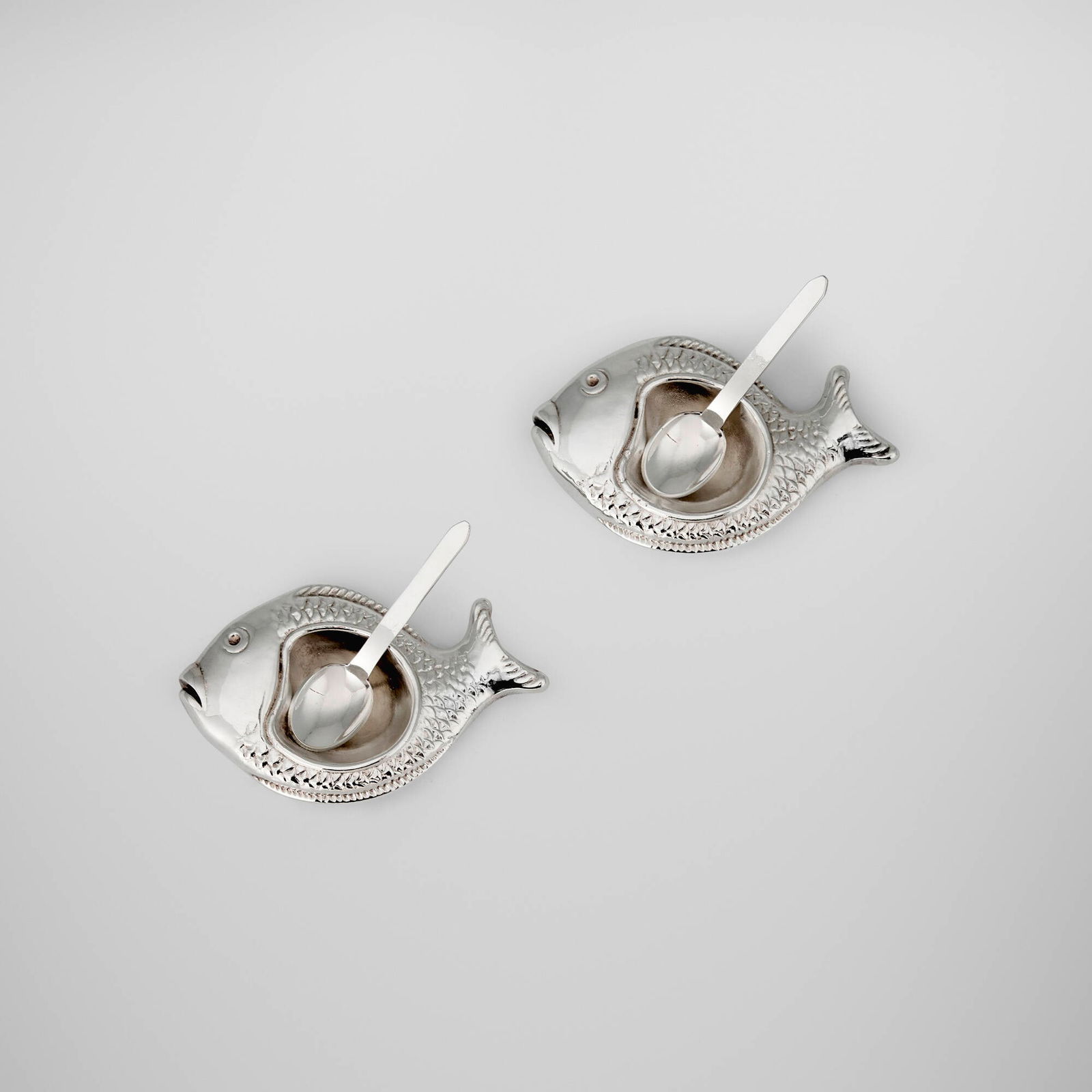 Christofle, Gallia fish salt cellars with spoons, pair: Christofle Gallia fish salt cellars with spoons, pair France, 1935-83silver-plated metal 2.5 h x 1.75 w x 0.5 d in (6 x 4 x 1 cm) Impressed manufacturer's mark and maker's mark to underside of