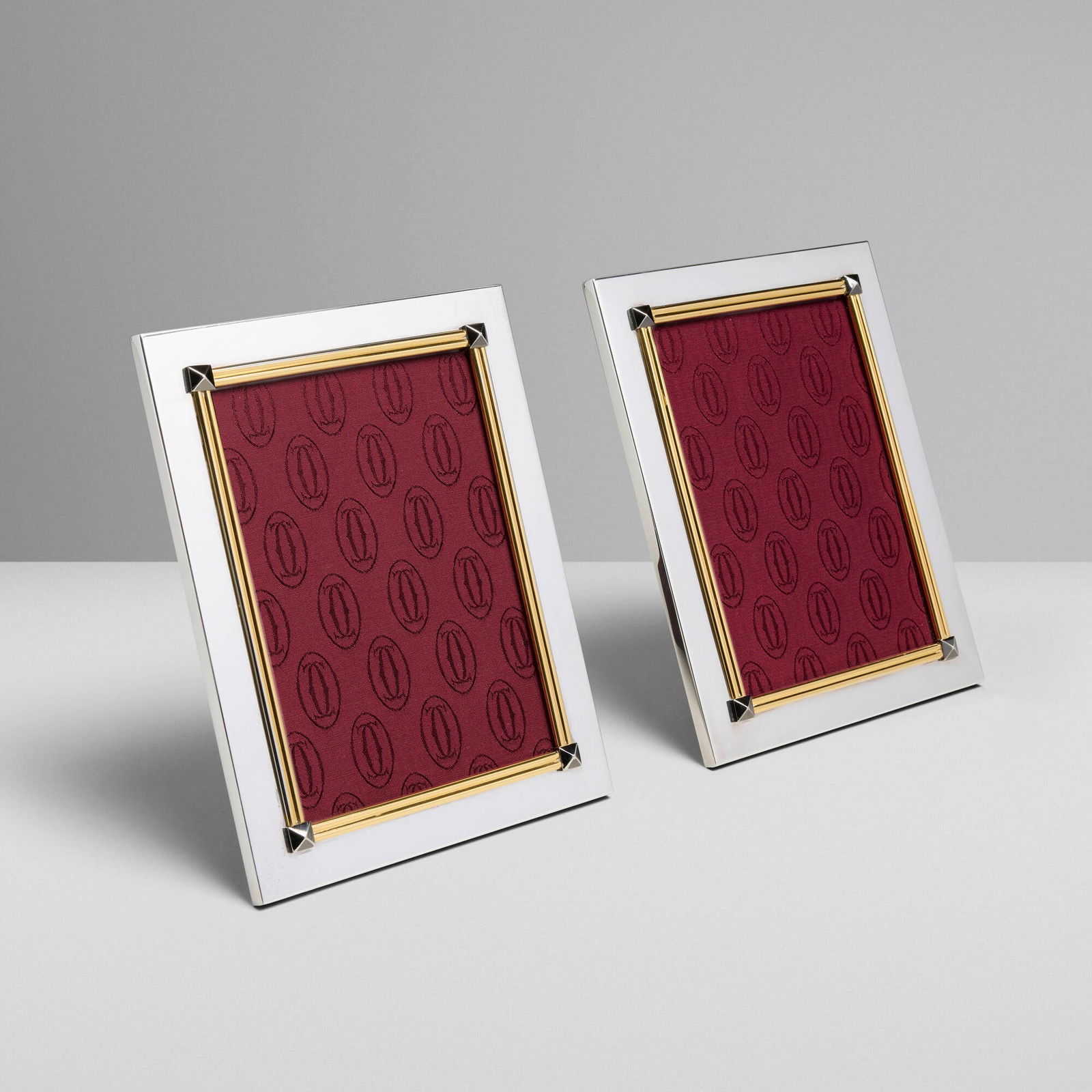 Cartier, Picture frames, pair: Cartier Picture frames, pair France / Spain, c. 1985silver-plated metal parcel-gilt, glass, leather, fabric 9 h x 7 w x 0.5 d in (23 x 18 x 1 cm) Impressed manufacturer's mark to edge of each