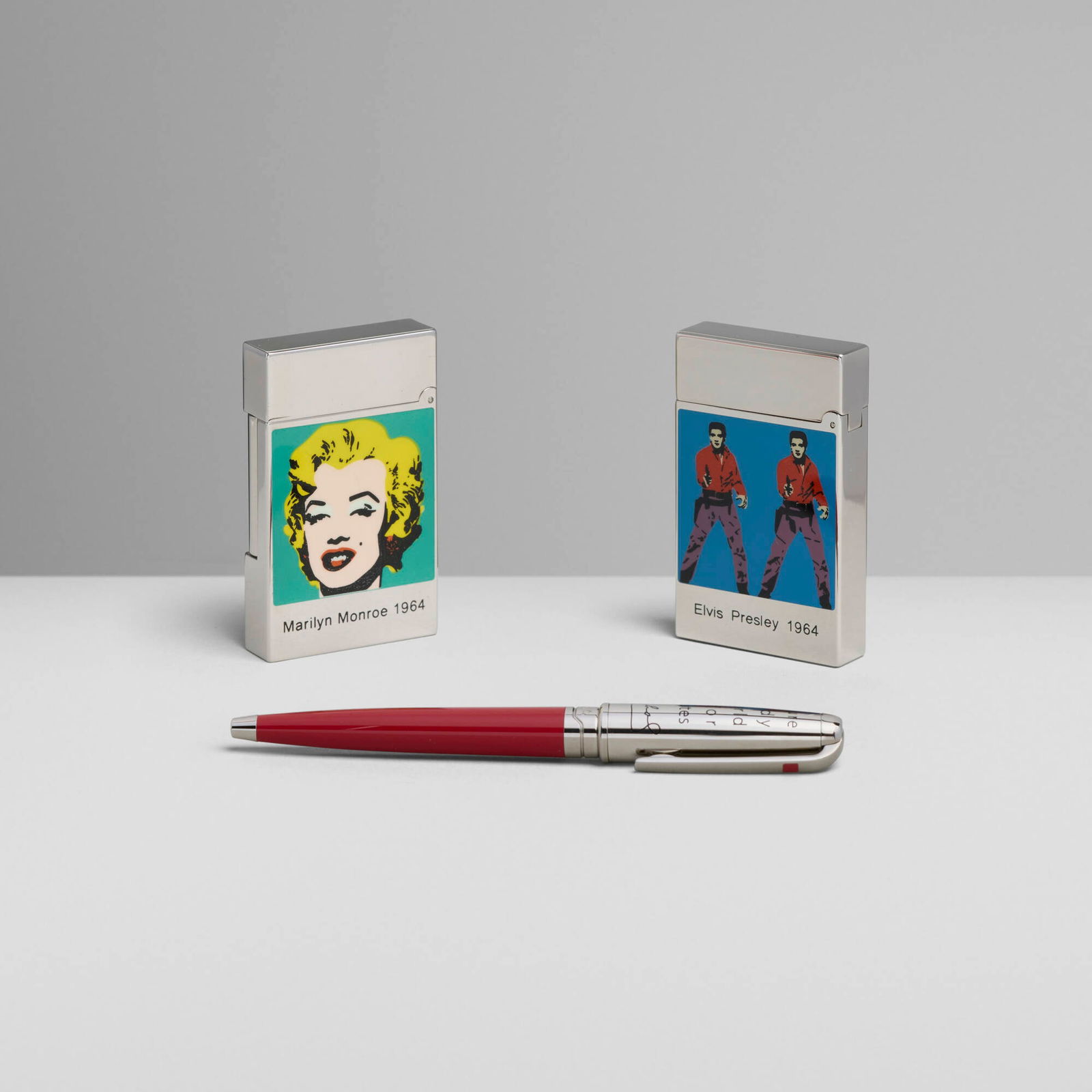 S.T. Dupont, Collection of Andy Warhol-line works: S.T. Dupont Collection of Andy Warhol-line works France, 2004 lacquer, palladium-plated metal lighter: 2.375 h x 1.5 w x 0.375 d in (6 x 4 x 1 cm) pen: 4.25 h x 0.5 w x 0.375 d in (11 x 1 x 1 cm) 