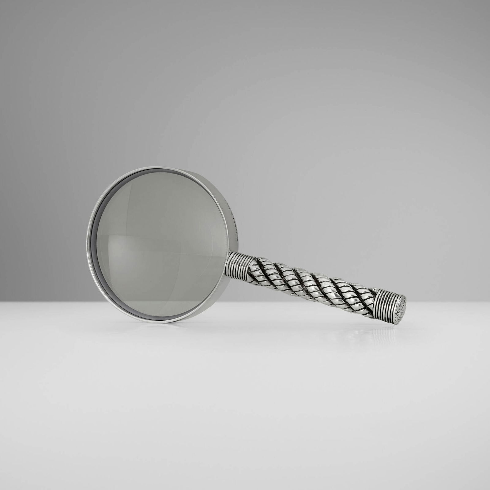 Hermes, Cordage magnifying glass: Hermes Cordage magnifying glass Ravinet d'Enfert & Cie France, c. 1965 silver-plated metal, glass 7.5 h x 3.5 w x 0.5 d in (19 x 9 x 1 cm) Impressed manufacturer's mark to edge 'Hermes Paris Made