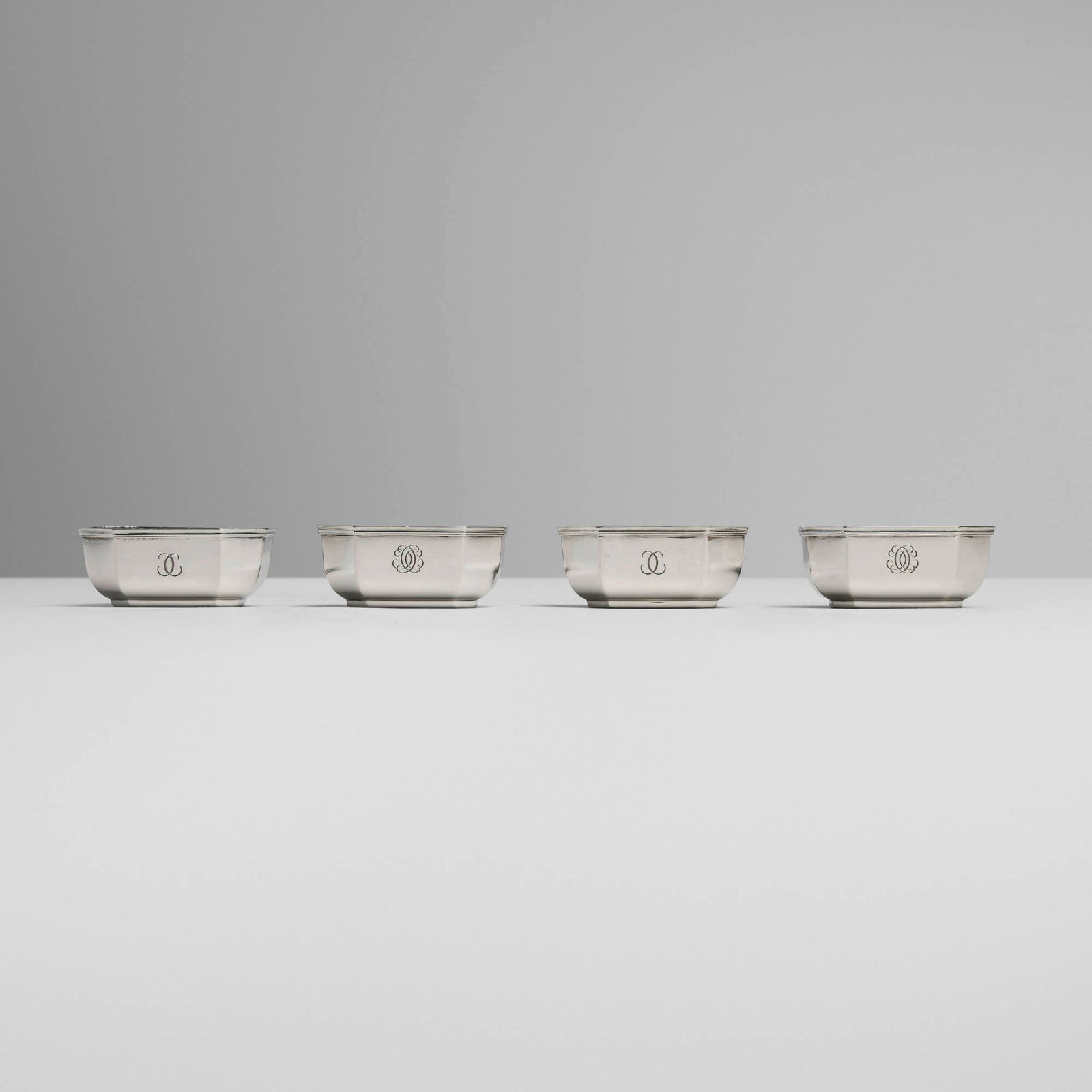 Puiforcat, Salt cellars, set of four: Puiforcat Salt cellars, set of four France, c. 1930.950 silver 1.125 h x 2.625 w x 2 d in (3 x 7 x 5 cm) Impressed maker's marks and French hallmark to each example. Engraved monogram to body