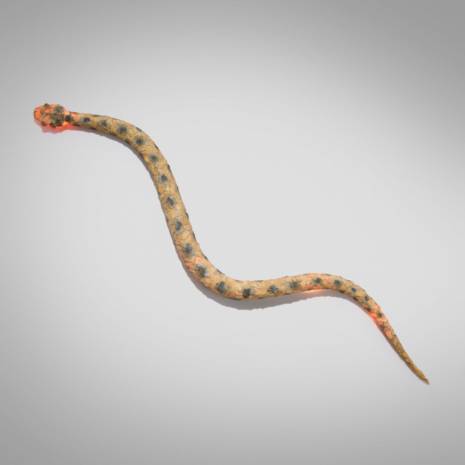 Frank Gehry, Snake lamp: Frank Gehry Snake lamp New City EditionsCanada/USA, 1989papier-mache, aluminum 3.25 h x 66.5 w x 12 d in (8 x 169 x 30 cm) Signed to underside 'Gehry'. Incised studio manufacturer's mark