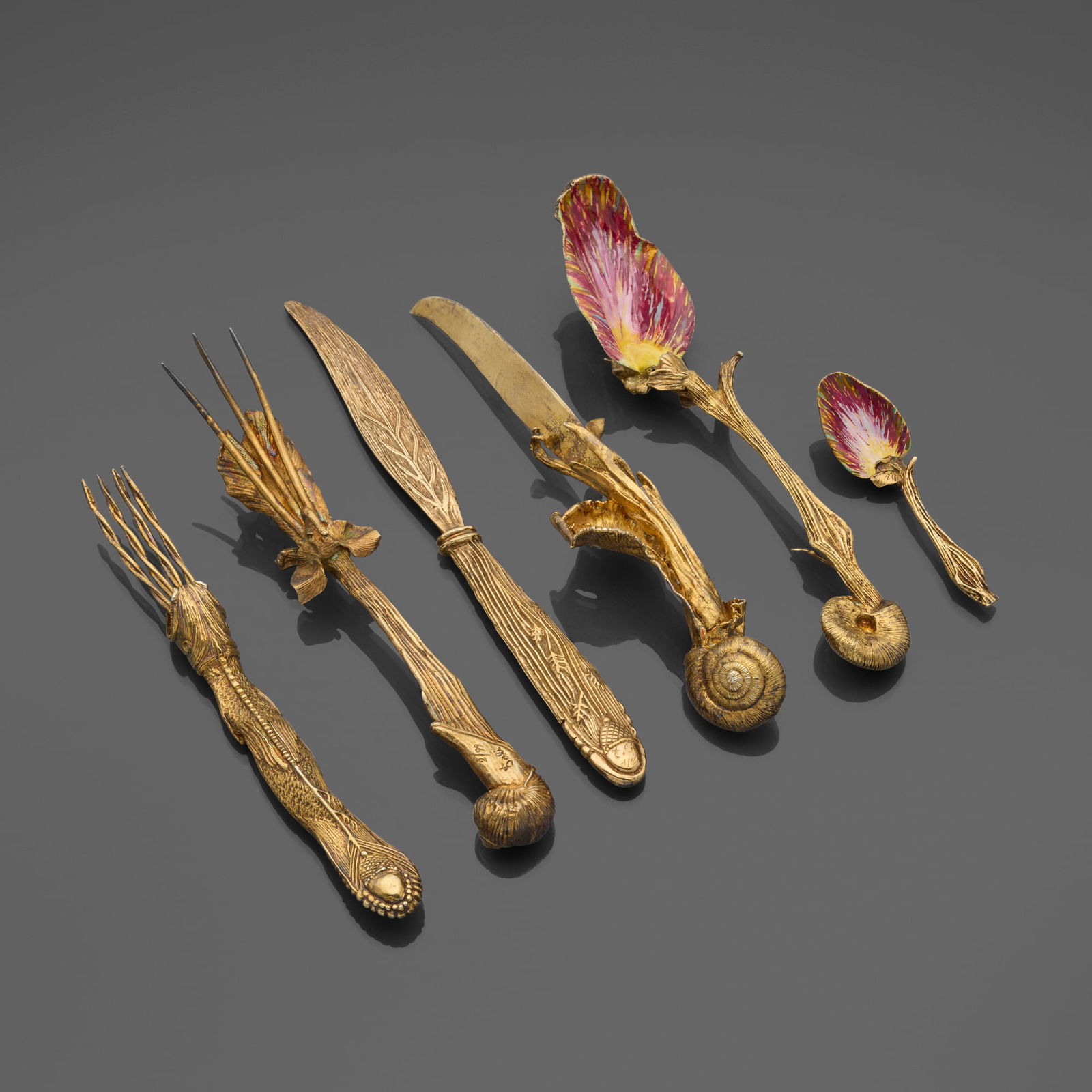 After Salvador Dali, Rare Menagere Mollusc flatware service: After Salvador Dali Rare Menagere Mollusc flatware service Ateliers HugoSpain / France, 1957silver gilt, enamel Impressed signature and date to each element 'Dali 1957' with number.