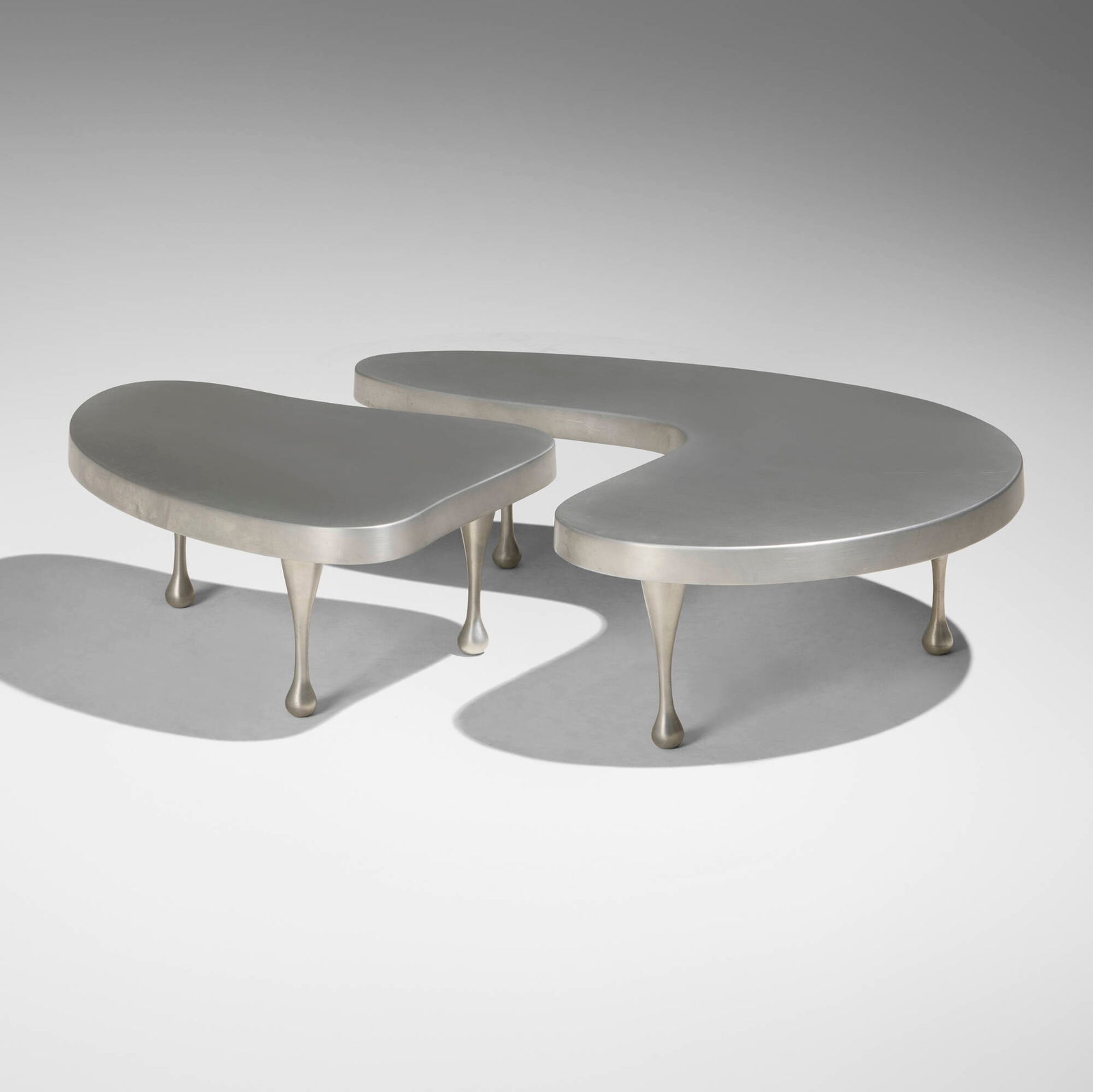 Frederick Kiesler, Nesting coffee tables, set of two: Frederick Kiesler Nesting coffee tables, set of two Jason McCoy Gallery Austria/USA, 1935 / c. 1990 cast aluminum 9.5 h x 34 w x 25 d in (24 x 86 x 63 cm) 9.5 h x 22.25 w x 16 d in (24 x 57 x 41