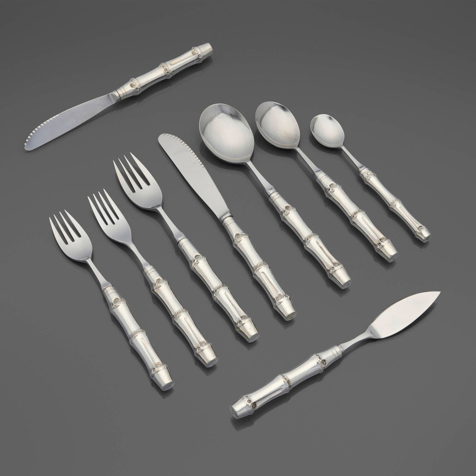 Christian Dior, Bamboo flatware service: Christian Dior Bamboo flatware service France, c. 1975 sterling silver, stainless steel Complete nine-piece service for eleven, plus eight serving articles and thirty-nine additional utensils; 146