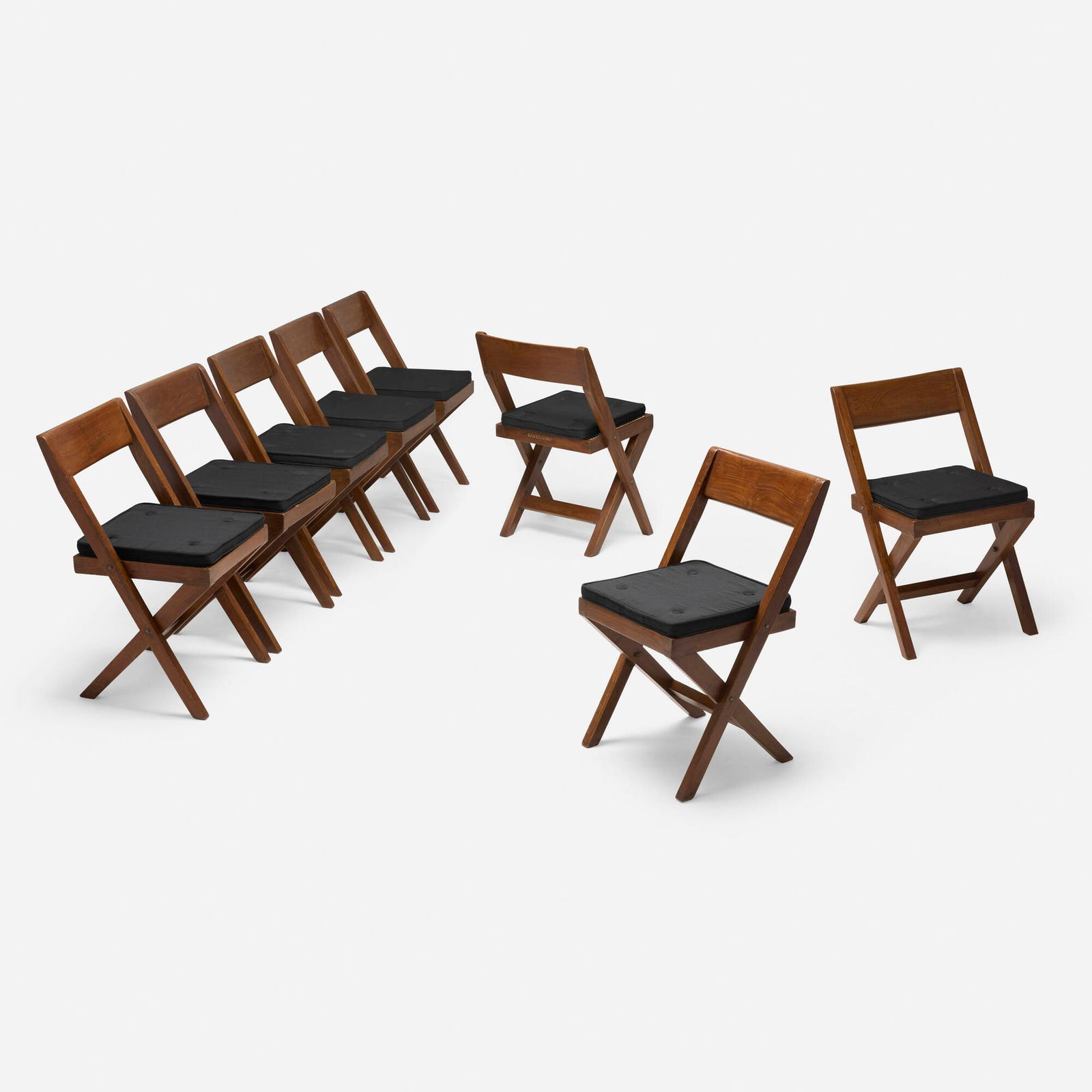 Pierre Jeanneret, Chairs from Punjab University, Chandigarh, set of eight: Pierre Jeanneret Chairs from Punjab University, Chandigarh, set of eight France/India, c. 1960 teak, cane 30.25 h x 17.5 w x 20.25 d in (77 x 44 x 51 cm) Stenciled mark to reverse of each example.