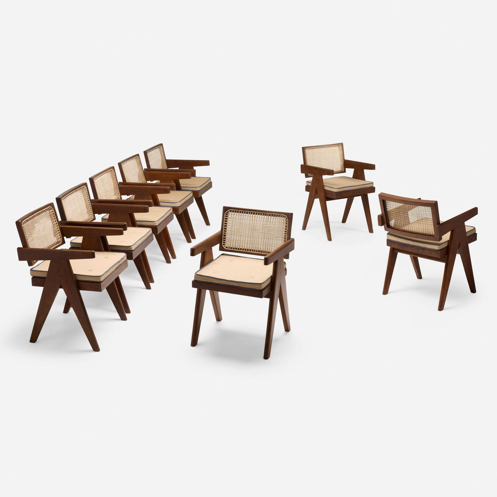Pierre Jeanneret, Office chairs from Chandigarh, set of eight: Pierre Jeanneret Office chairs from Chandigarh, set of eight France/India, c. 1960 teak, cane, upholstery 30.75 h x 20.5 w x 22 d in (78 x 52 x 56 cm) Stenciled marks to reverse of each example. 