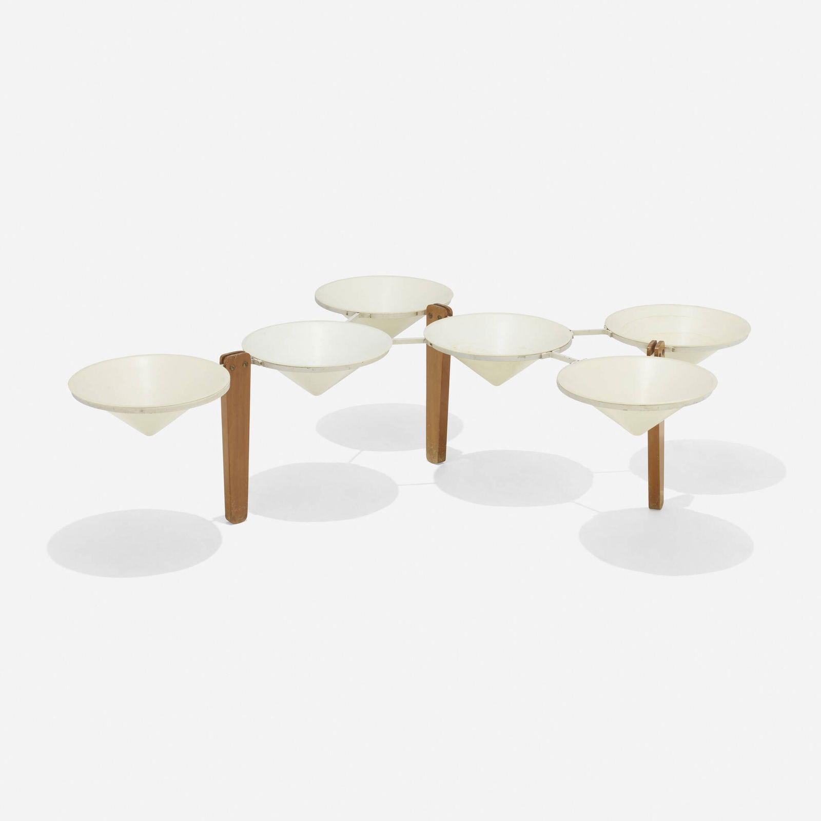 George Nelson & Associates, Rare plant stand: George Nelson & Associates Rare plant stand Howard Miller Clock CompanyUSA, c. 1952walnut, enameled metal, plastic 11 h x 48 w x 28 d in (28 x 122 x 71 cm) This rare design by George Nel