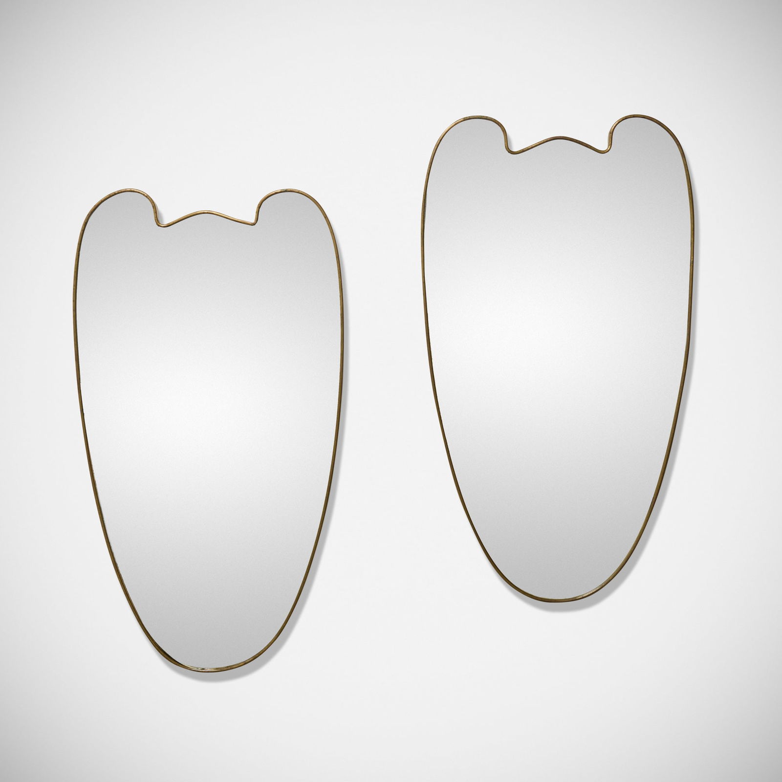 Italian, Wall-hanging mirrors, pair: Italian Wall-hanging mirrors, pair c. 1955 brass, mirrored glass 38 h x 21.25 w x 1.25 d in (97 x 54 x 3 cm) Provenance: JF Chen, Los Angeles This work will ship from Los Angeles, California.