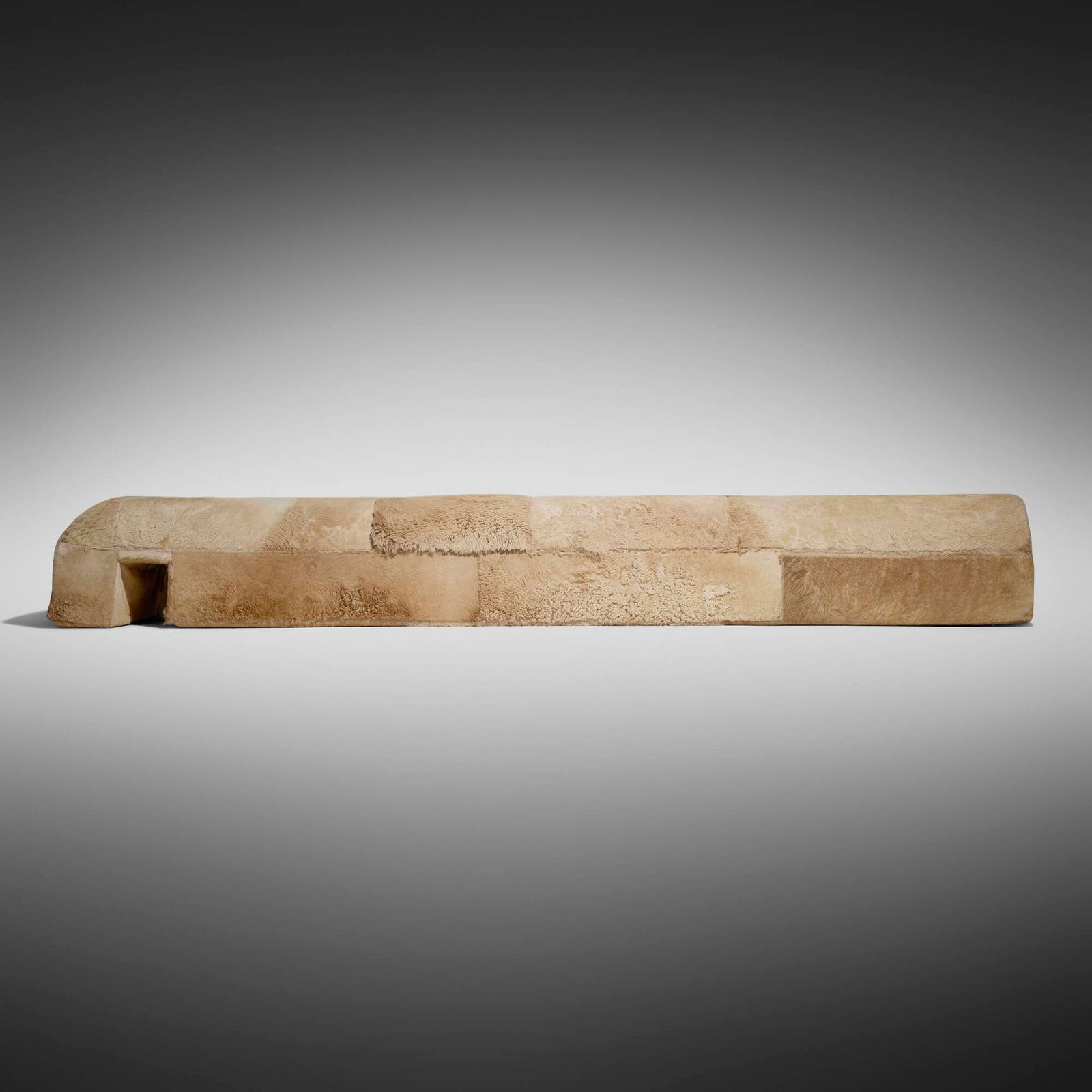 Rick Owens, Important Camel Obelisk bench: Rick Owens Important Camel Obelisk bench USA/France, 2016 elm wood, foam, camel hide 20 h x 150 w x 35 d in (51 x 381 x 89 cm) Obelisk can be displayed vertically or horizontally. Provenance: