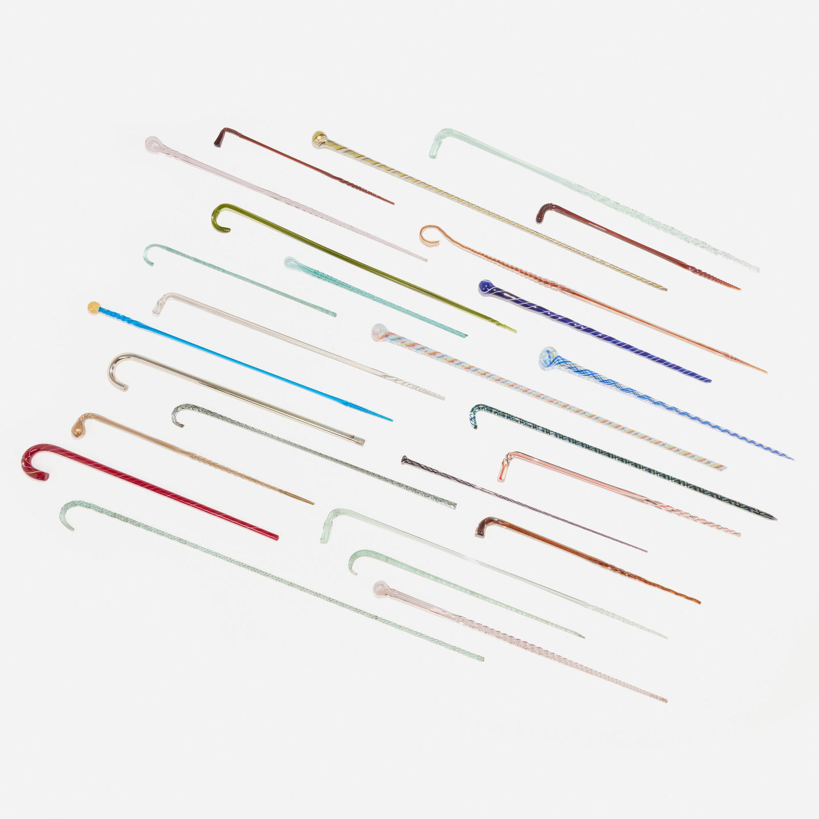 Murano, Collection of twenty-six walking sticks: Murano Collection of twenty-six walking sticks Italy, 20th century hand-blown glass largest: 59 h x 4 w x 0.75 d in (150 x 10 x 2 cm) smallest: 28 h x 2 dia in (71 x 5 cm) Provenance: JF Chen, Los