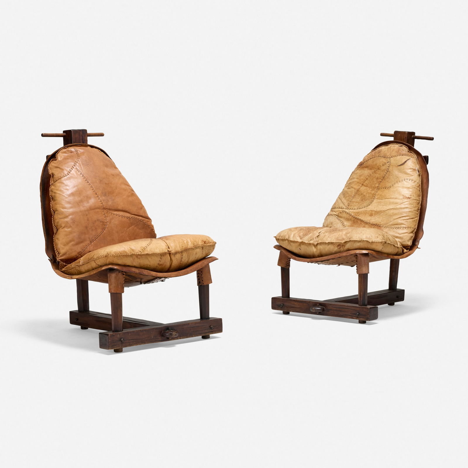 In the manner of Jean Gillon, Brutalist-style chairs, pair: In the manner of Jean Gillon Brutalist-style chairs, pair c. 1965 leather, walnut 43 h x 29 w x 34.5 d in (109 x 74 x 88 cm) Provenance: JF Chen, Los Angeles This work will ship from Los