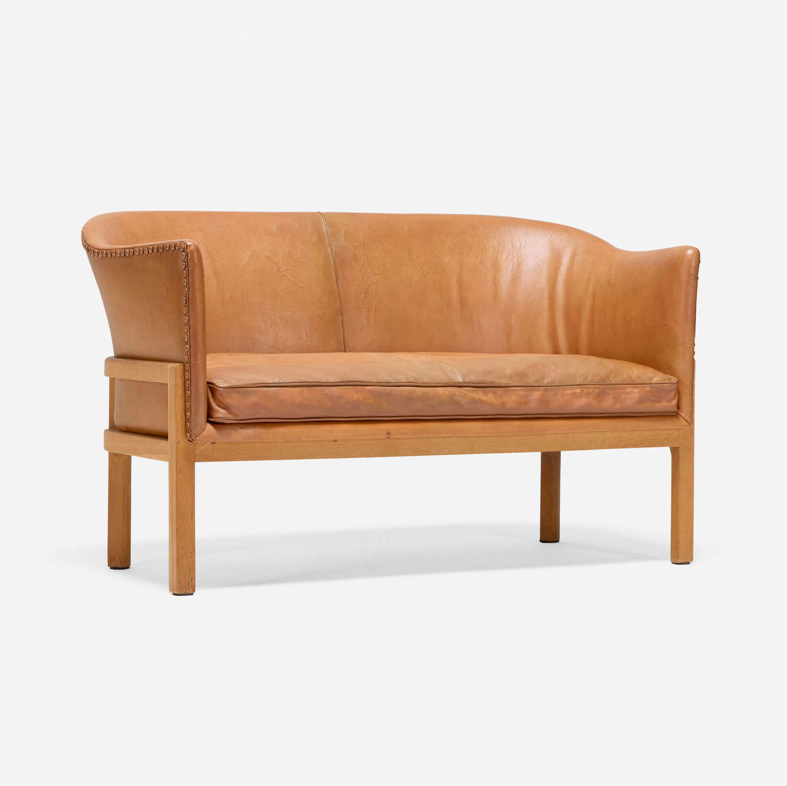Mogens Koch, Settee: Mogens Koch Settee Denmark, c. 1955leather, beech 28 h x 50 w x 25 d in (71 x 127 x 63 cm) Provenance: Private Collection | Wright, Scandinavian Design, 26 April 2018,