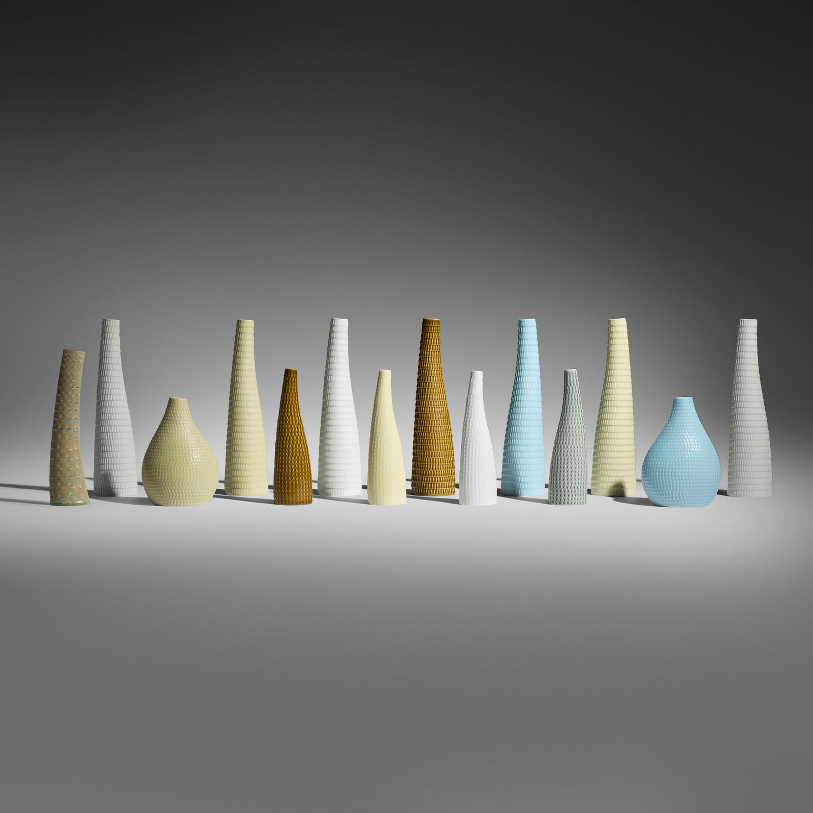 Stig Lindberg, Collection of fourteen Reptil vases: Stig Lindberg Collection of fourteen Reptil vases Gustavsberg Sweden, c. 1960 glazed stoneware largest: 12.125 h x 3 w x 2.5 d in (31 x 8 x 6 cm) smallest: 8.75 h x 2.5 w x 1.75 d in (22 x 6 x 4
