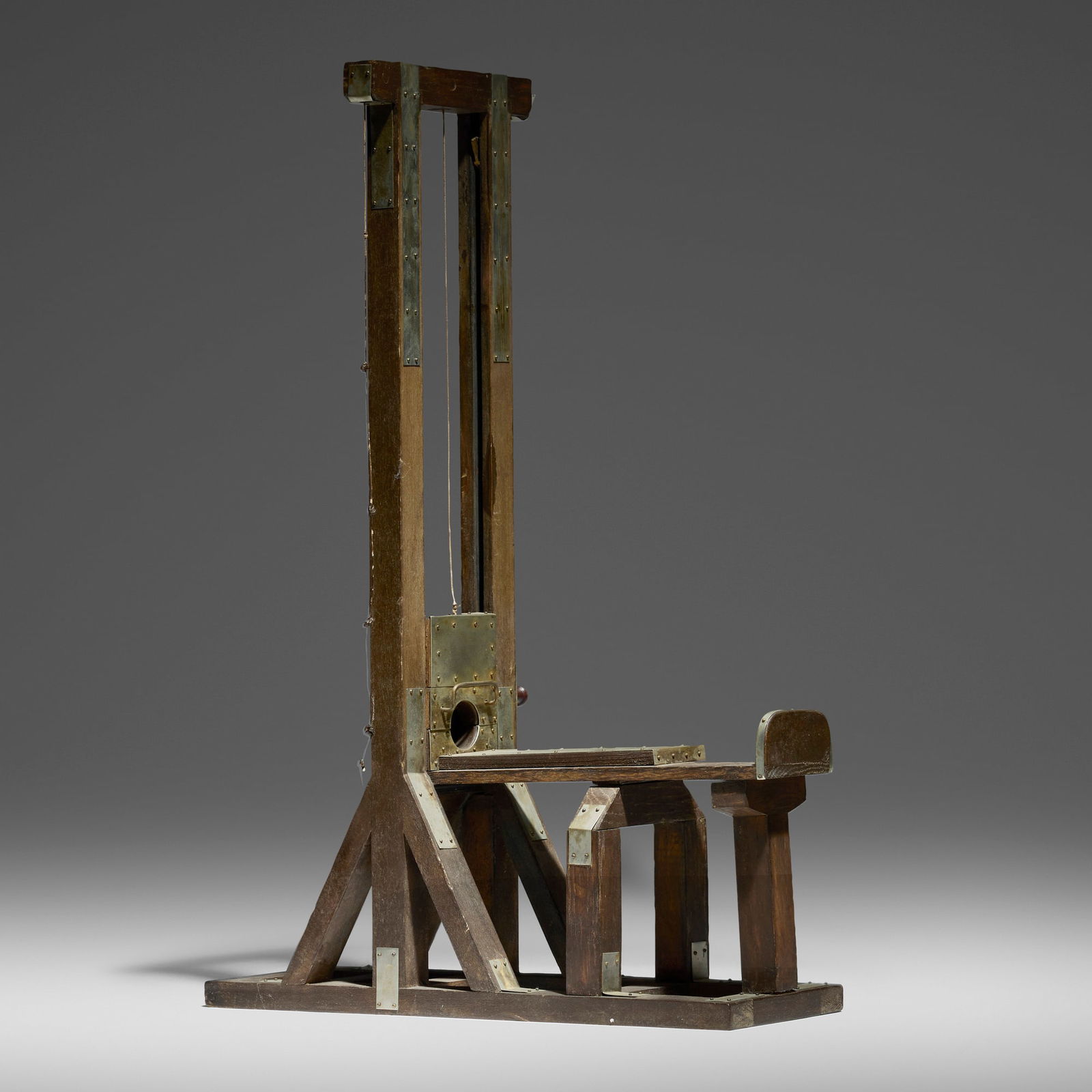 Guillotine cigar cutter: Guillotine cigar cutter late 19th century wood, aluminum, steel 17.75 h x 4.5 w x 12 d in (45 x 11 x 30 cm) Provenance: JF Chen, Los Angeles This work will ship from Los Angeles, California.