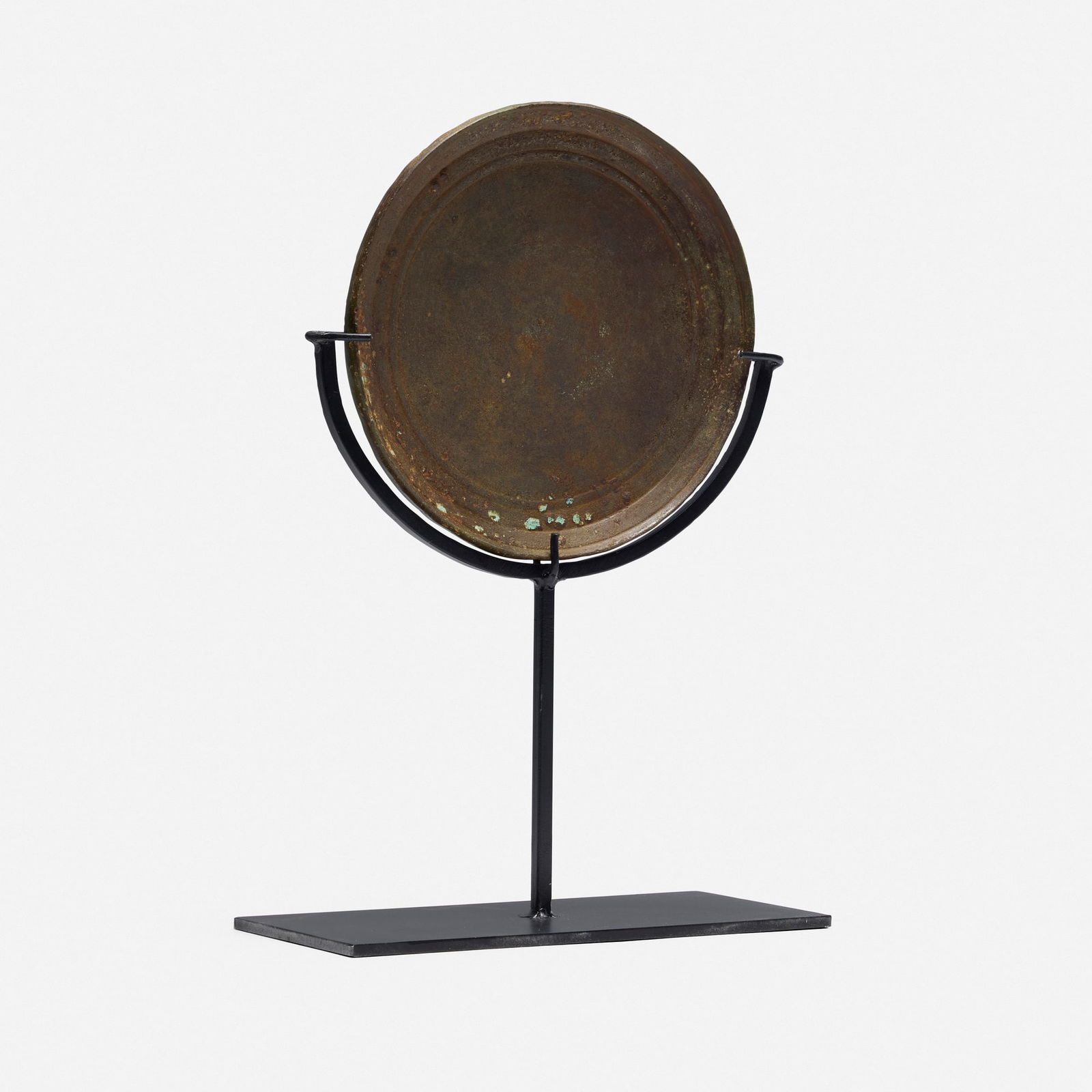 Khmer, Mirror: Khmer Mirror 13th-15th century bronze 0.25 d x 7 dia in (1 x 18 cm) Provenance: JF Chen, Los Angeles This work will ship from Los Angeles, California.