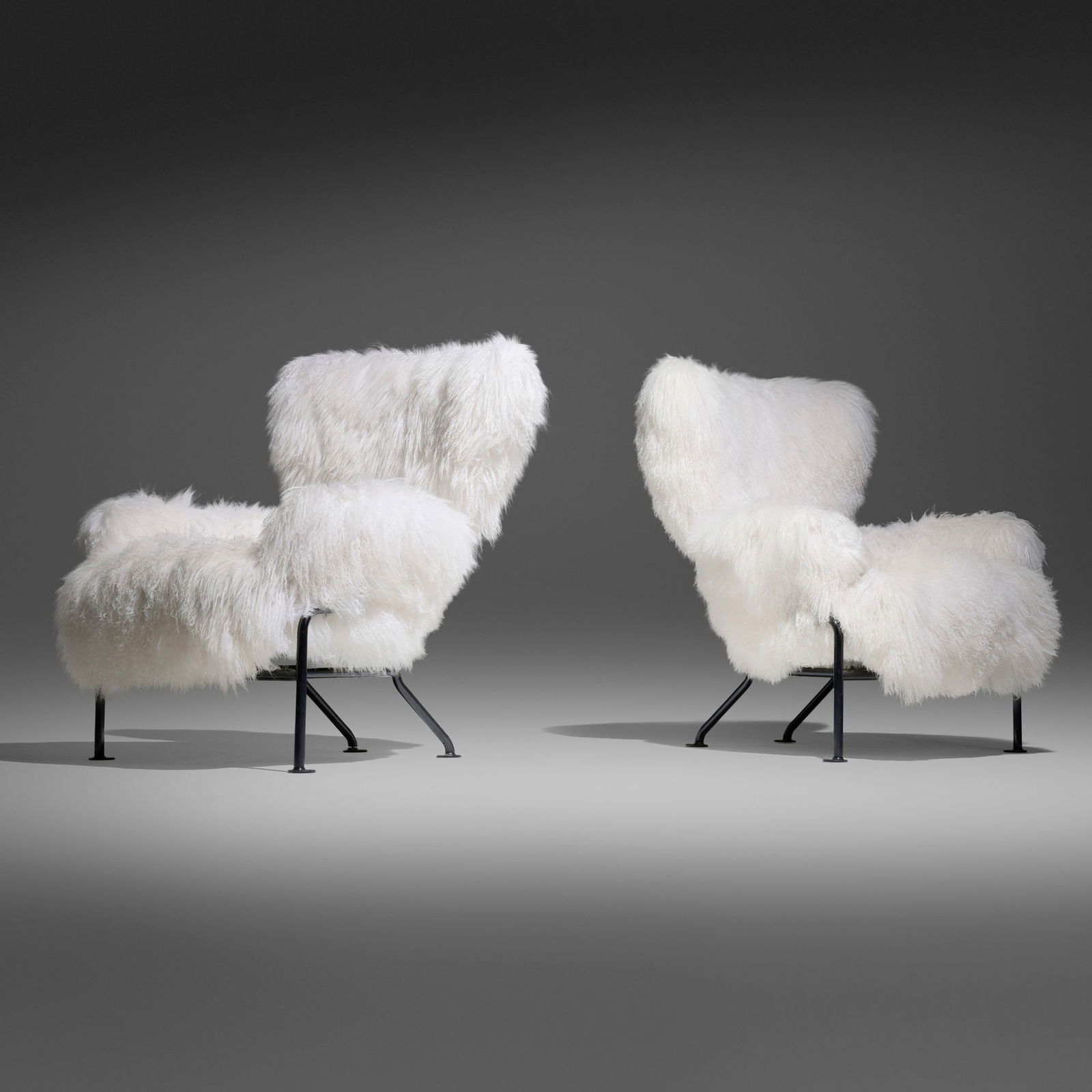 Franco Albini and Franca Helg, Tre Pezzi lounge chairs, pair: Franco Albini and Franca Helg Tre Pezzi lounge chairs, pair PoggiItaly, c. 1957enameled steel, sheepskin 38 h x 34 w x 28 d in (97 x 86 x 71 cm) Provenance: JF Chen, Los