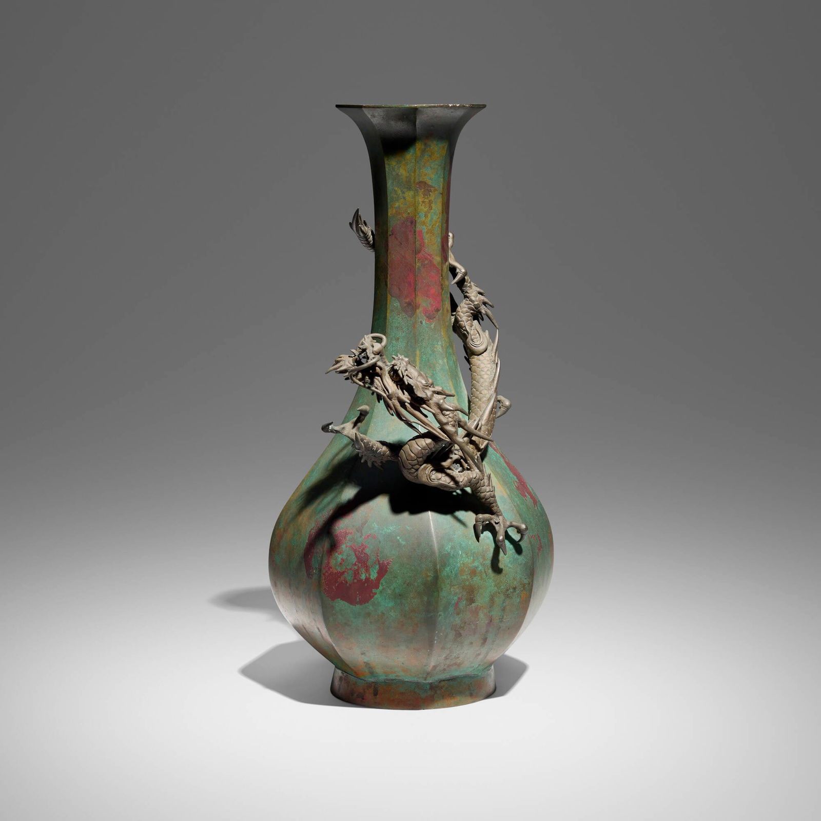 Japanese, Faceted vase with dragon: Japanese Faceted vase with dragon Meiji period patinated bronze 15.875 h x 8 w x 10 d in (40 x 20 x 25 cm) Etched number to underside '382-1008209'. Provenance: JF Chen, Los Angeles This work