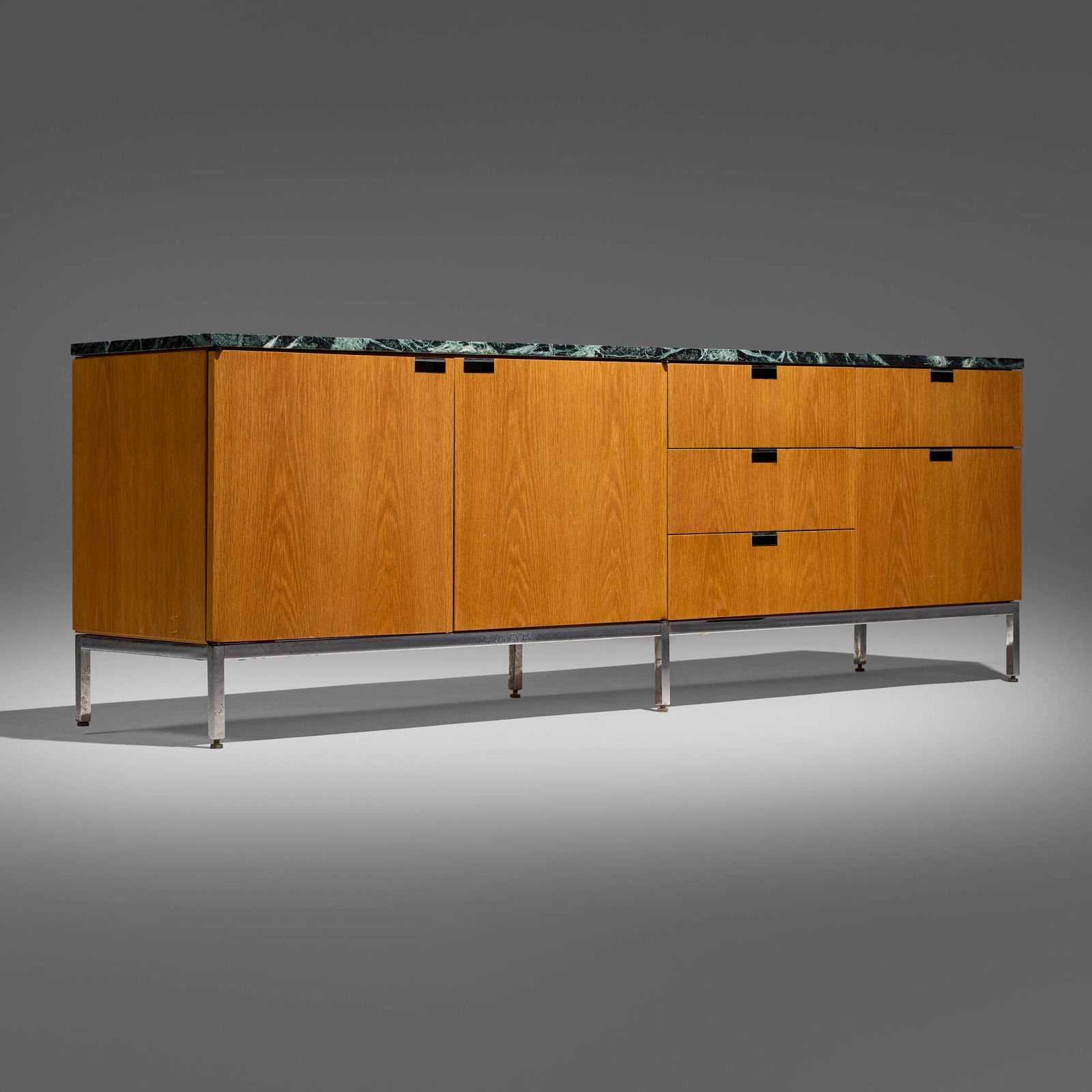 Florence Knoll, Executive Office cabinet: Florence Knoll Executive Office cabinet Knoll Associates USA, 1954 / c. 1965 oak, marble, chrome-plated steel 26 h x 75 w x 18 d in (66 x 190 x 46 cm) Cabinet features five drawers and two doors