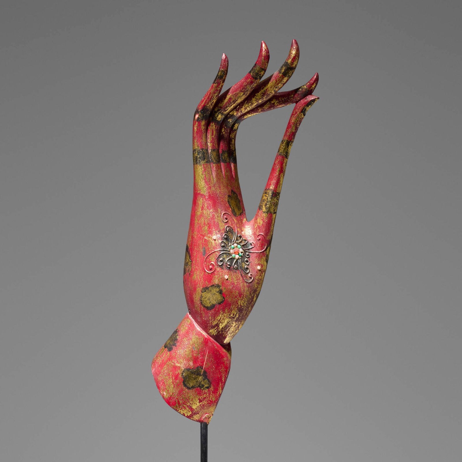 Southeast Asian, Large Vitarka Mudra hand of Buddha: Southeast Asian Large Vitarka Mudra hand of Buddha 20th century painted wood, beads 29.5 h x 12 w x 11.5 d in (75 x 30 x 29 cm) Provenance: JF Chen, Los Angeles This work will ship from Los