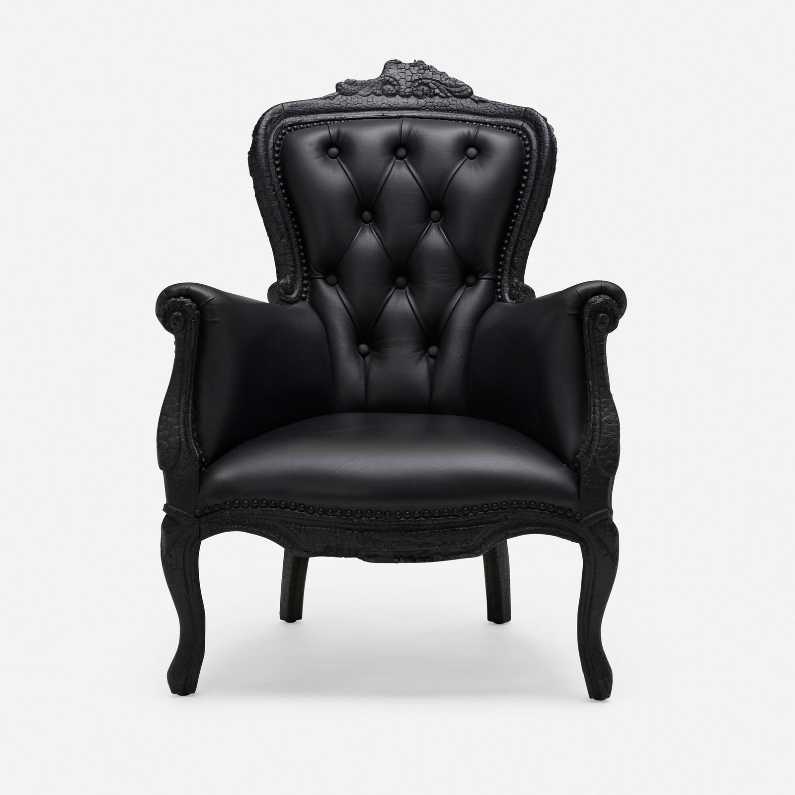 Maarten Baas, Where There's Smoke chair: Maarten Baas Where There's Smoke chair Moooi The Netherlands, 2002 charred wood, leather 40 h x 29.25 w x 31 d in (102 x 74 x 79 cm) Metal manufacturer's label to underside 'Moooi Smoke Furniture