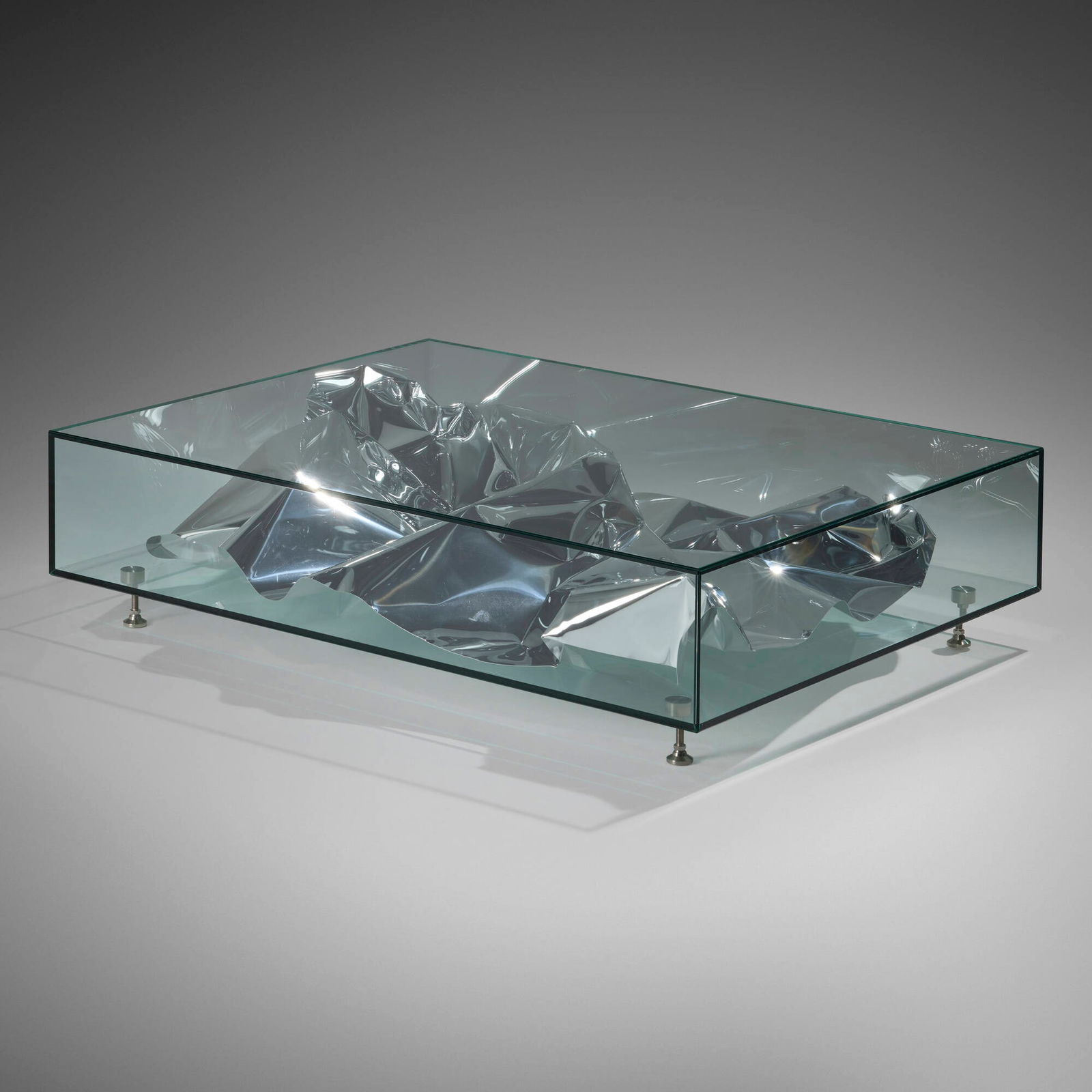Patrik Fredrickson and Ian Stallard, Silver Crush table: Patrik Fredrickson and Ian Stallard Silver Crush table David Gill, Ltd. United Kingdom, 2011 glass, aluminum, steel 13 h x 51 w x 39 d in (33 x 130 x 99 cm) Decal manufacturer's label to underside