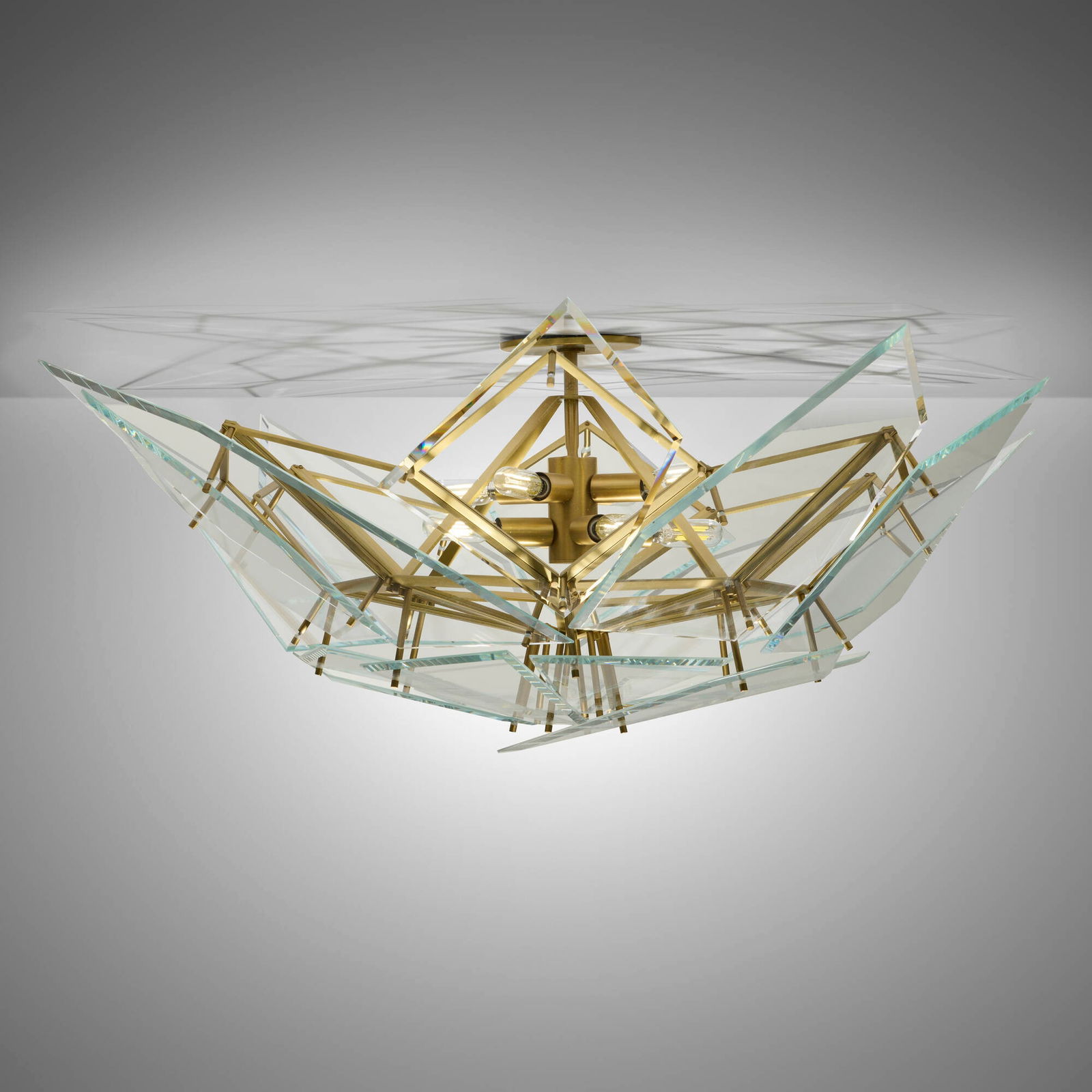 Mary Wallis, Edie ceiling lamp, model ED.08.02: Mary Wallis Edie ceiling lamp, model ED.08.02 Lindsey Adelman Studio Australia / USA, 2016 brushed brass, beveled clear glass 15 h x 43 w x 36 d in (38 x 109 x 91 cm) Decal manufacturer's labels