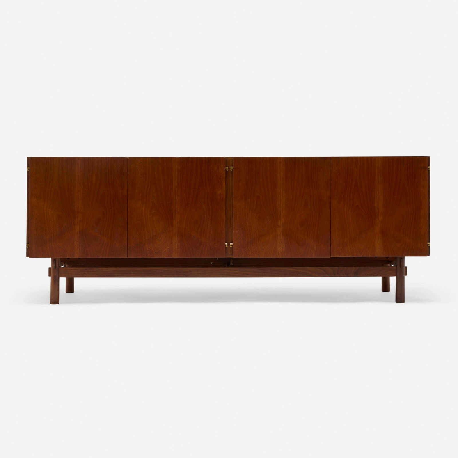 Modern, Cabinet: Modern Cabinet c. 1965 teak, brass 28 h x 75.875 w x 18 d in (71 x 193 x 46 cm) Cabinet features four doors concealing five drawers, two fixed shelves, one slide-out tray for bottle storage, and
