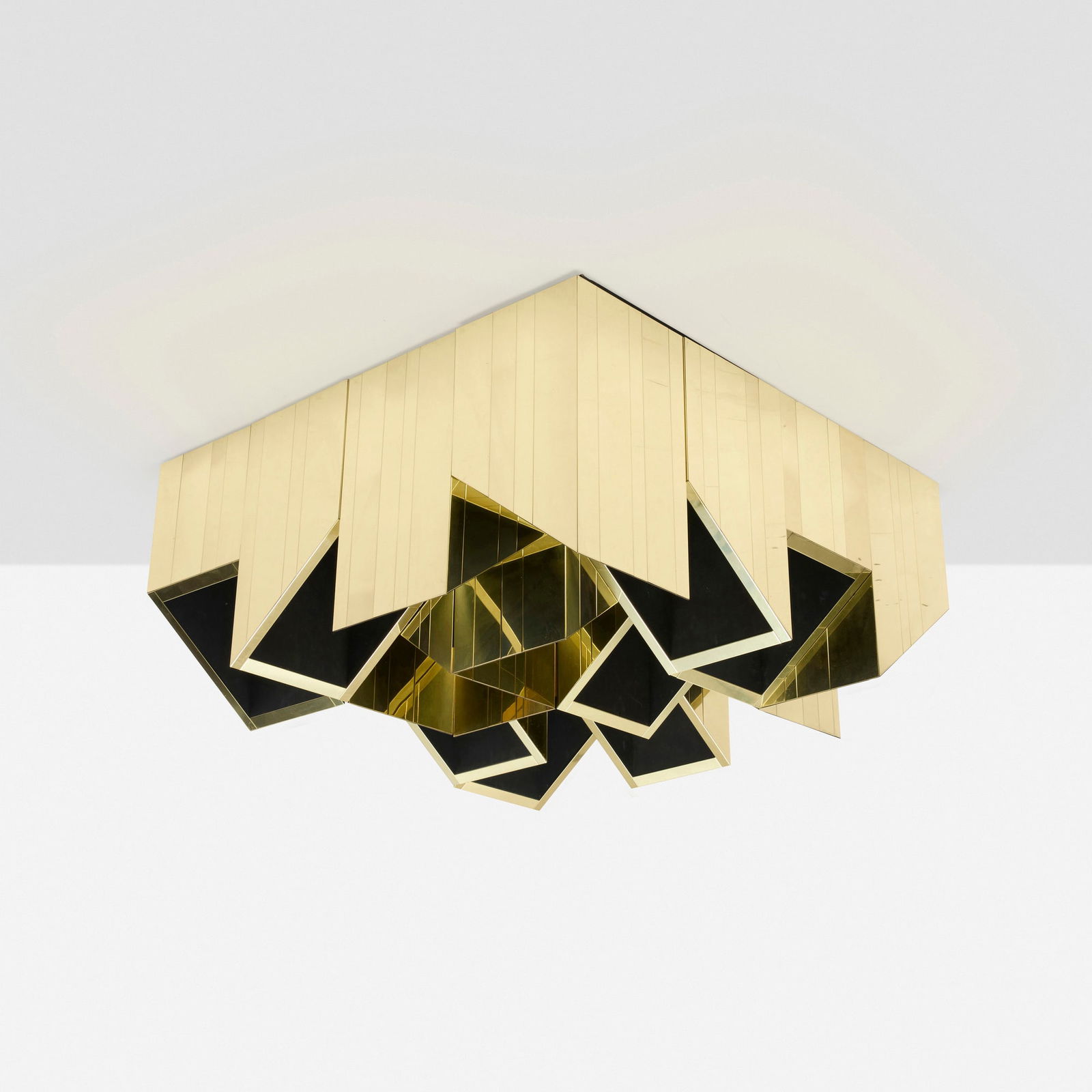 Paul Evans, Custom Cityscape ceiling fixture: Paul Evans Custom Cityscape ceiling fixture Paul Evans Studio USA, c. 1972 brass 16.25 h x 36.5 w x 36.5 d in (41 x 93 x 93 cm) Provenance: Private Collection, Allentown, PA | Private Collection |