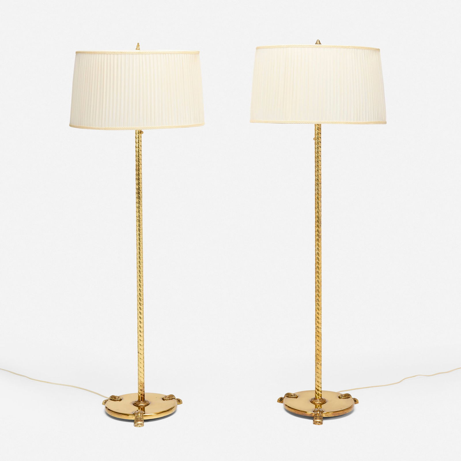 Finnish, Floor lamps, pair: Finnish Floor lamps, pair c. 1955 brass, silk shades 60.5 h x 22 dia in (154 x 56 cm) Provenance: Private Collection This work will ship from Chicago, Illinois.