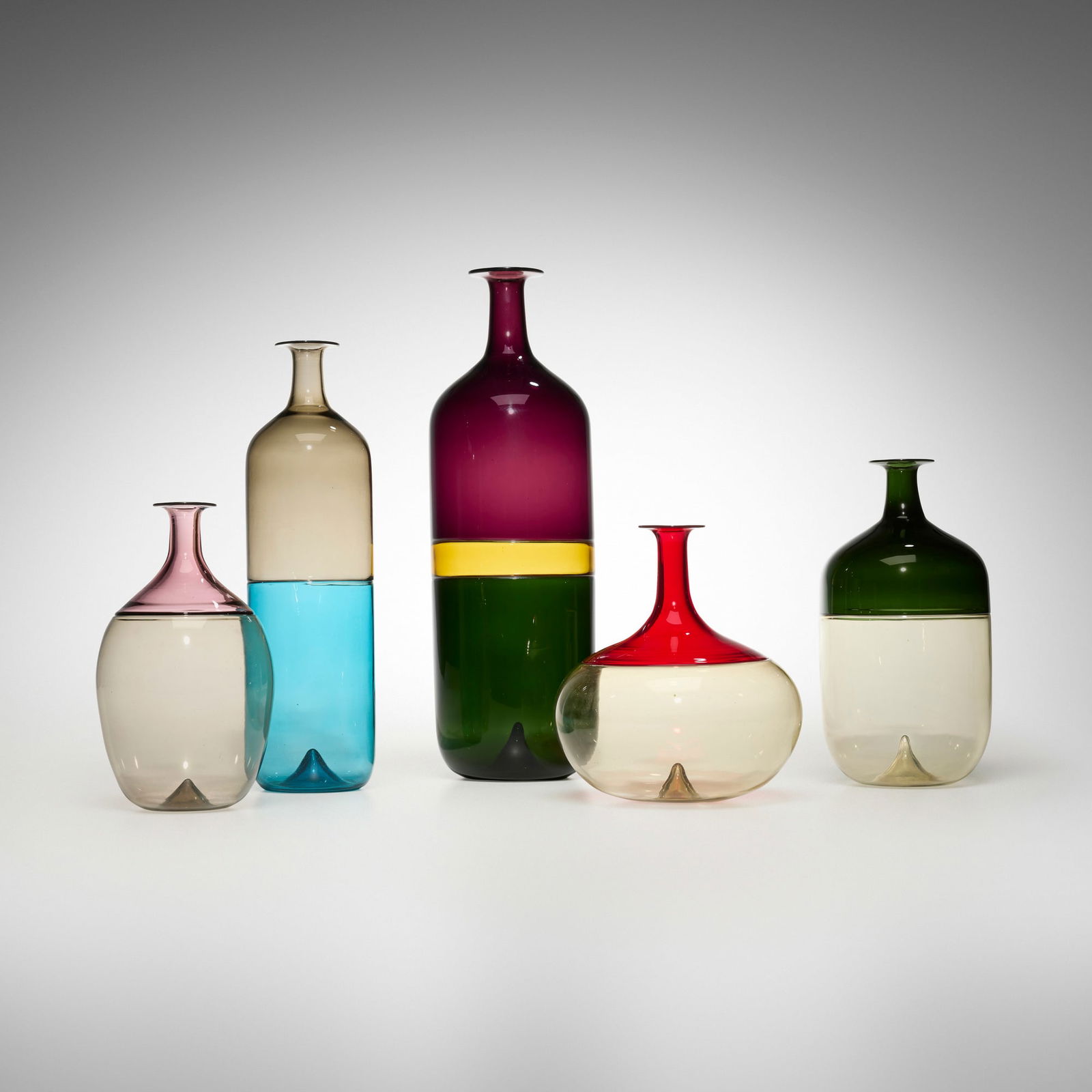 Tapio Wirkkala, Collection of five Bolle vases: Tapio Wirkkala Collection of five Bolle vases Venini Finland / Italy, 2002-03 incalmo glass largest: 16.5 h x 6 dia in (42 x 15 cm) smallest: 8.5 h x 4.75 dia in (22 x 12 cm) Etched signature and