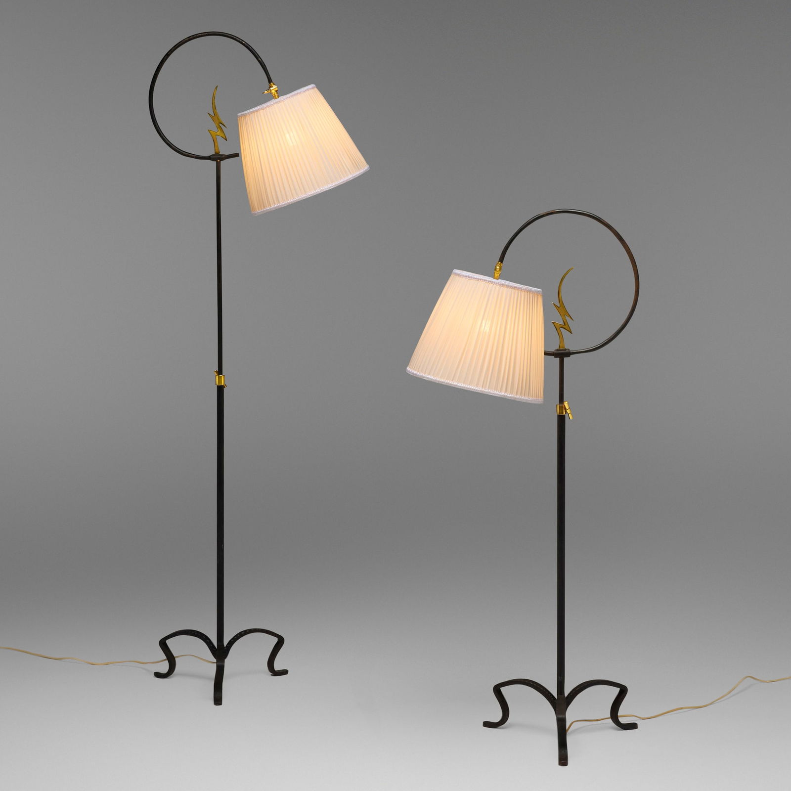 Taidetakomo Hakkarainen, Adjustable floor lamps, pair: Taidetakomo Hakkarainen Adjustable floor lamps, pair Finland, c. 1935 wrought iron, brass, silk shades 61 h x 13 w x 21.5 d in (155 x 33 x 55 cm) Height adjusts from 44.5 to 61 inches. 