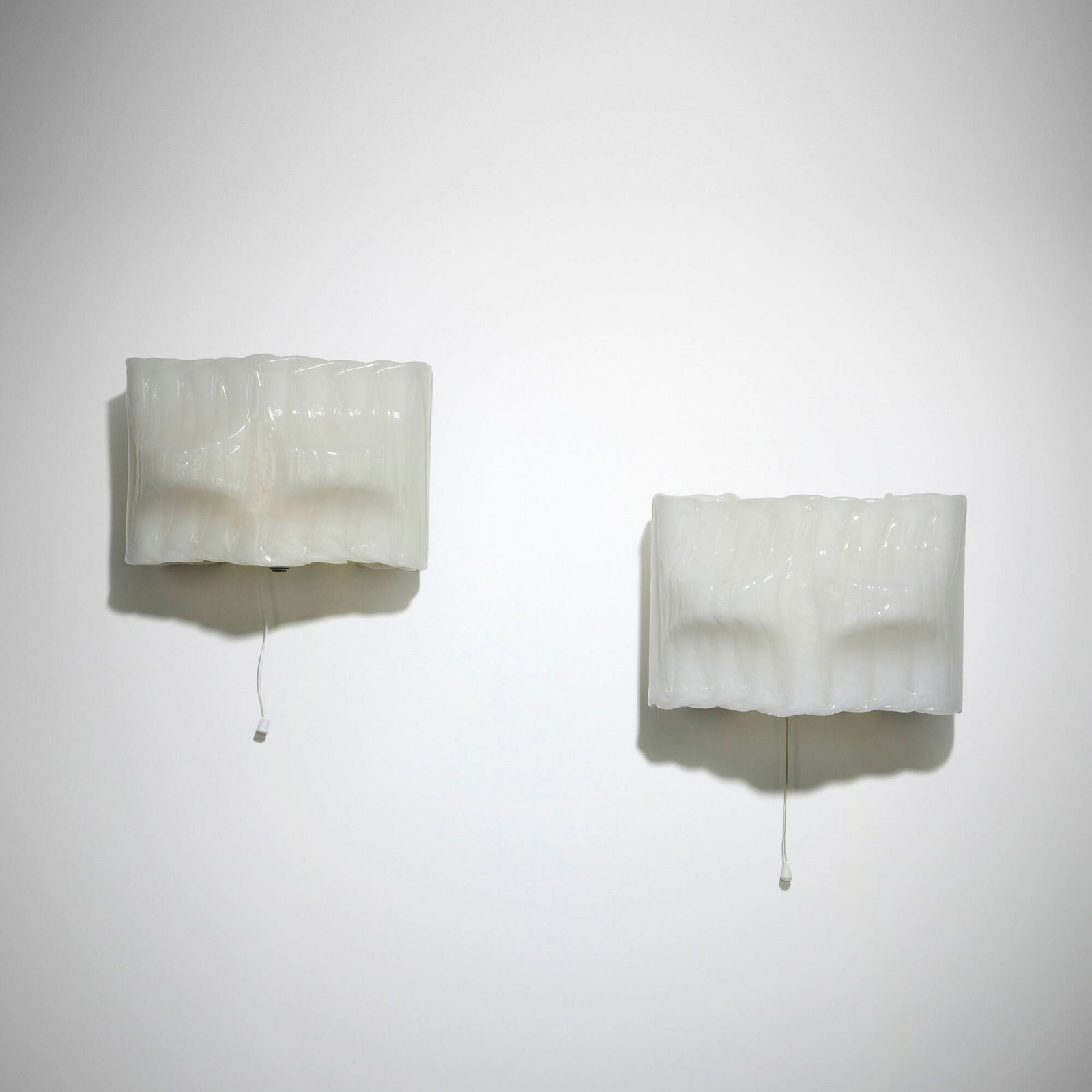 Valinte Oy, Sconces model 23137, pair: Valinte Oy Sconces model 23137, pair Finland, c. 1972 acrylic 7.375 h x 10.25 w x 6 d in (19 x 26 x 15 cm) Impressed manufacturer's mark to mounting plate 'Valinte 23137'. Provenance: Private