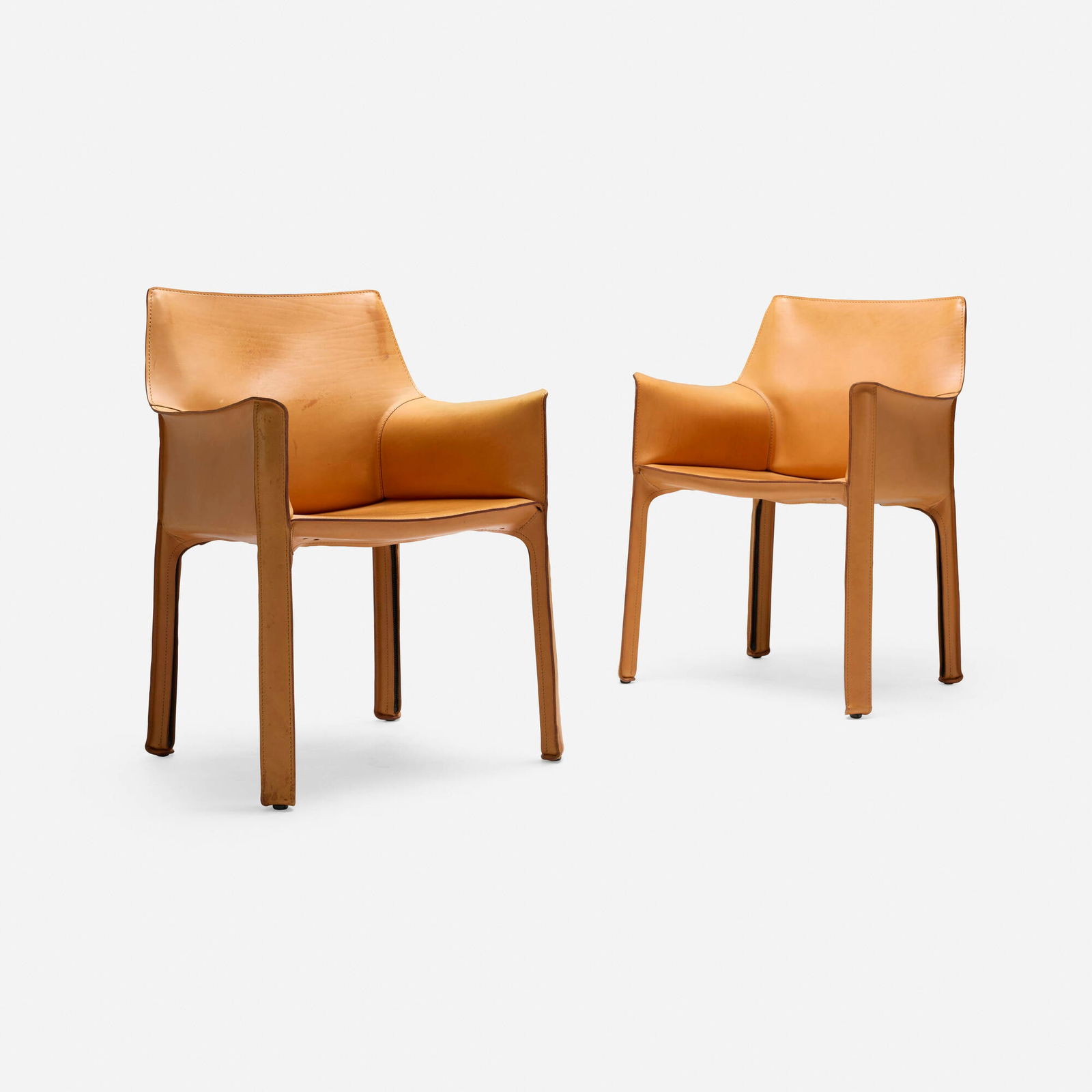 Mario Bellini, Cab chairs model 413, pair: Mario Bellini Cab chairs model 413, pair CassinaItaly, 1976 / after 1993leather over steel, plastic 32 h x 24 w x 19.5 d in (81 x 61 x 50 cm) Molded manufacturer's mark to underside of e