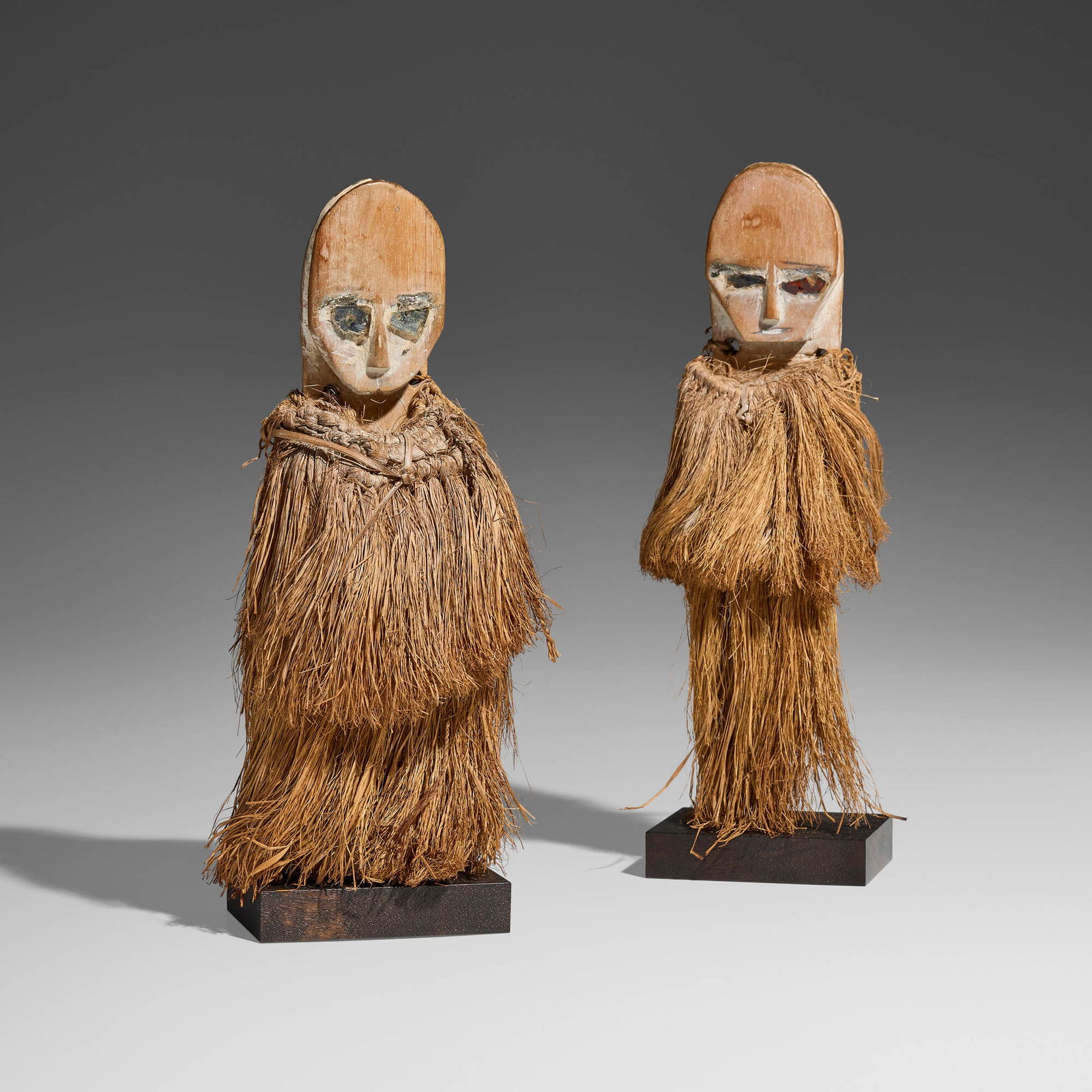Fang, Rare shoulder masks, pair: Fang Rare shoulder masks, pair Gabon, late 19th-early 20th century carved wood, raffia, mirrored glass, kaolin 11 h x 3.5 w x 2.5 d in (28 x 9 x 6 cm) 10.75 h x 3.5 w x 2.5 d in (27 x 9 x 6 cm) 