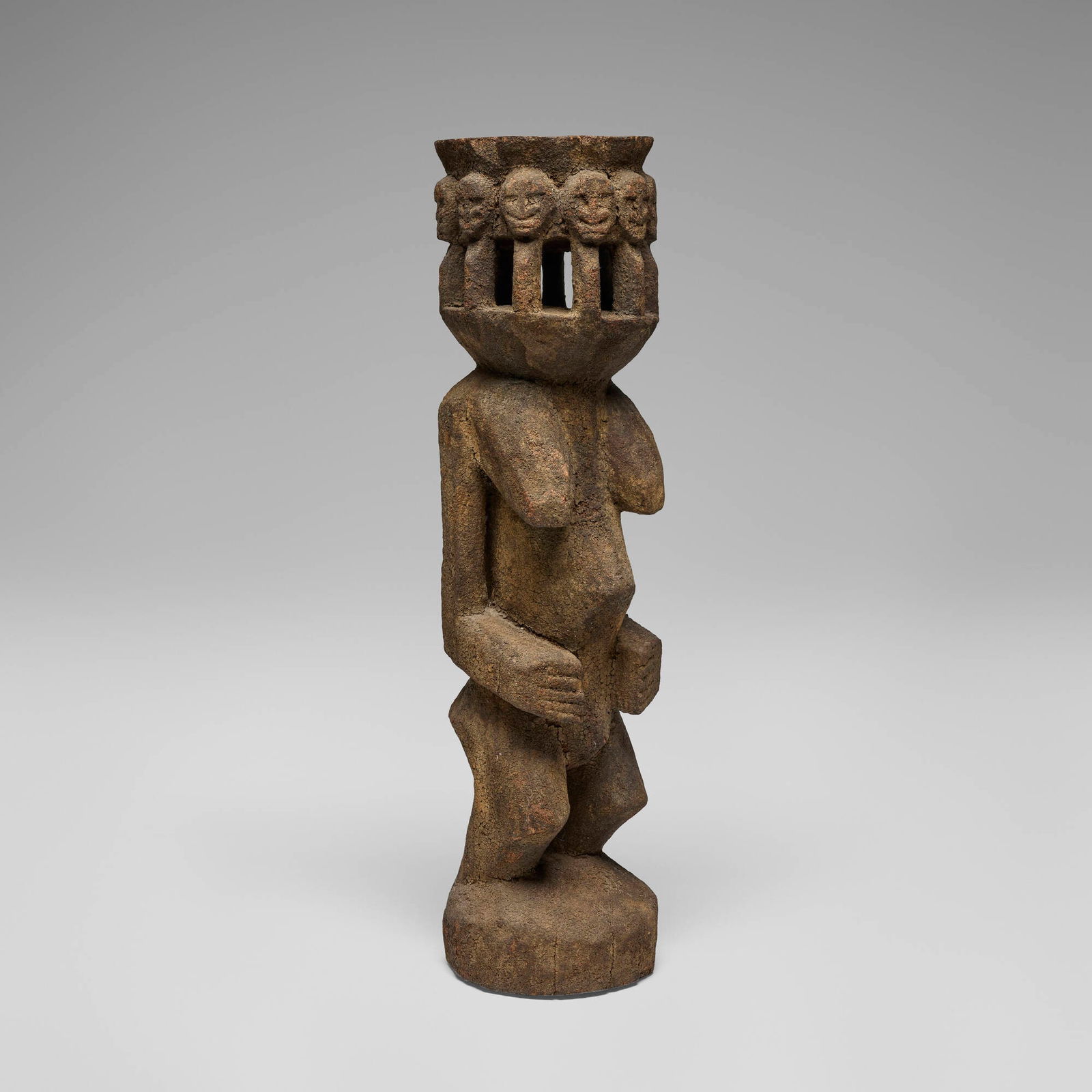 Dogon, Female figure: Dogon Female figure Mali, late 19th-early 20th century carved wood with ritual encrustation 29 h x 8 dia in (74 x 20 cm) Provenance: Acquired in the 1960s, Collection of Ulrich and Ruth Frank |