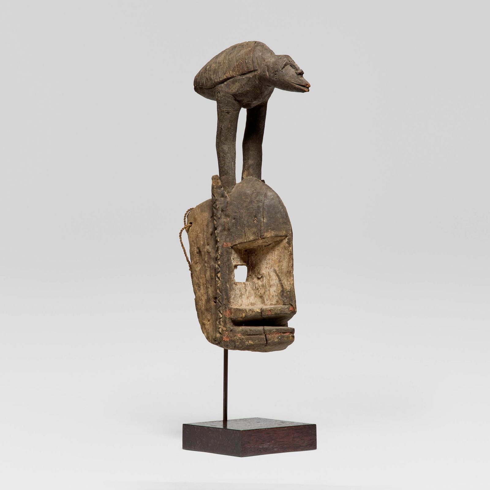 Dogon, Mask with bird: Dogon Mask with bird Mali, 20th century carved wood, pigment, rope 21.5 h x 6 w x 11.5 d in (55 x 15 x 29 cm) This work will ship from Los Angeles, California.