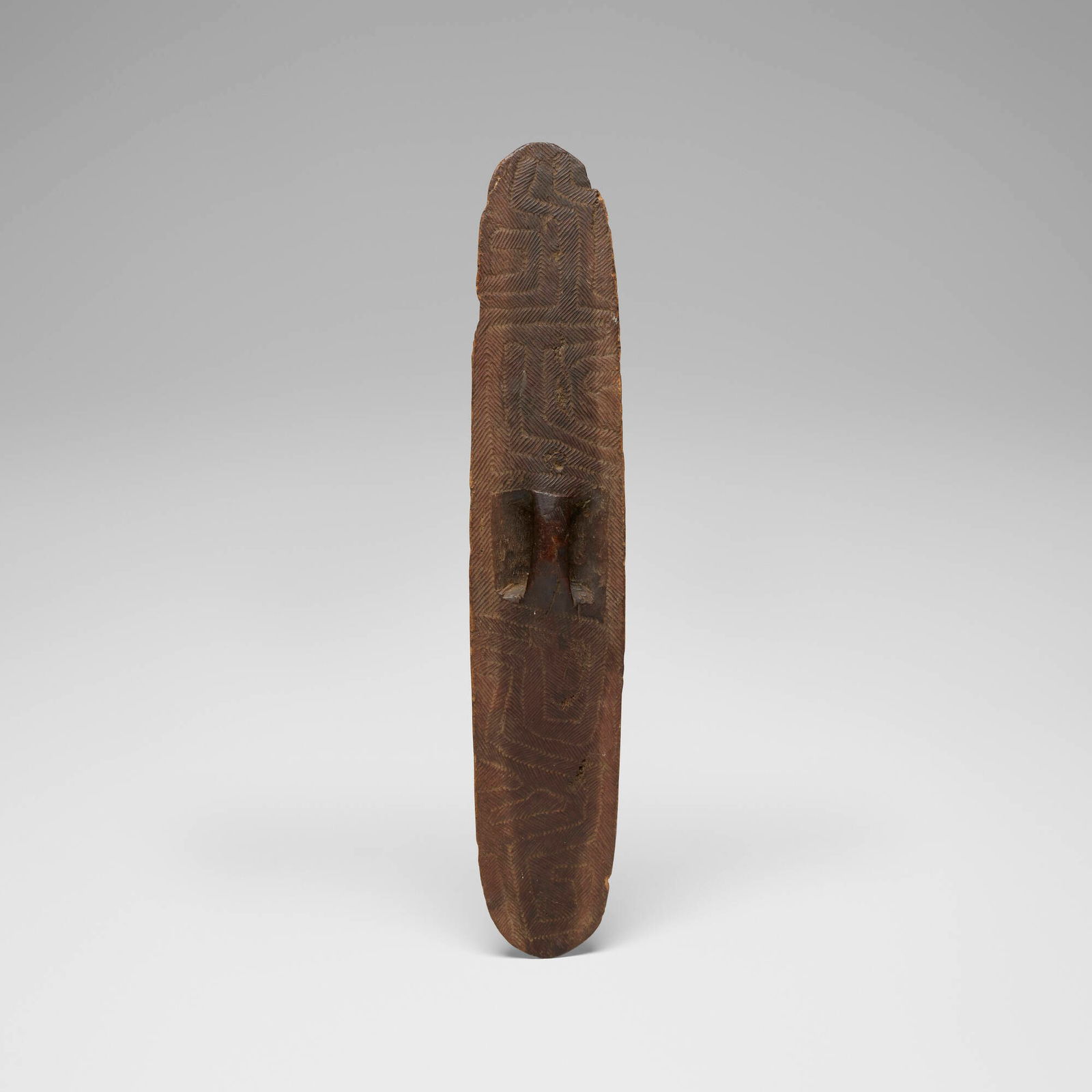 Aboriginal, Parrying shield: Aboriginal Parrying shield Western Australia, early 20th century carved wood 30.25 h x 5.5 w x 2.5 d in (77 x 14 x 6 cm) Provenance: Dorothy Wingert Gallery, Honolulu | Acquired from the previous