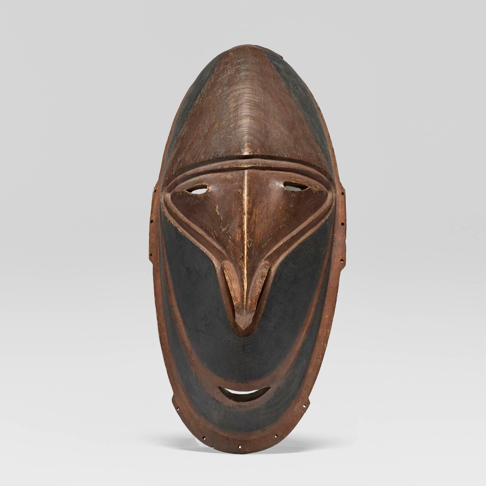 Sepik River, Ancestor spirit mask: Sepik River Ancestor spirit mask Papua New Guinea carved and painted wood 20.75 h x 9.5 w x 7.5 d in (53 x 24 x 19 cm) Provenance: Private Collection | Acquired from the previous in 1982 by the