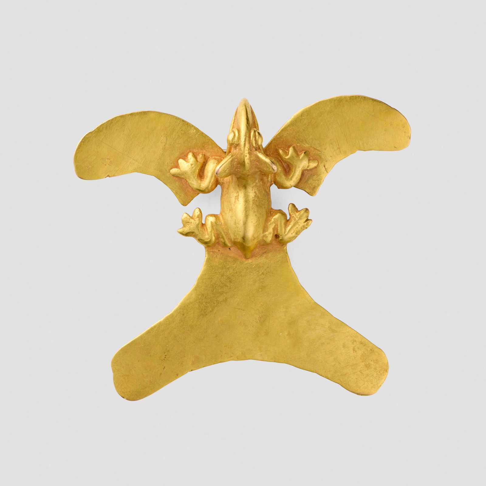 Veraguas, Zoomorphic frog/avian pendant: Veraguas Zoomorphic frog/avian pendant Panama, 800-1500 CE 14k gold 2.5 h x 2.75 w x 0.625 d in (6 x 7 x 2 cm) Provenance: Andre Emmerich Gallery, New York | Private Collection Literature: Sweat
