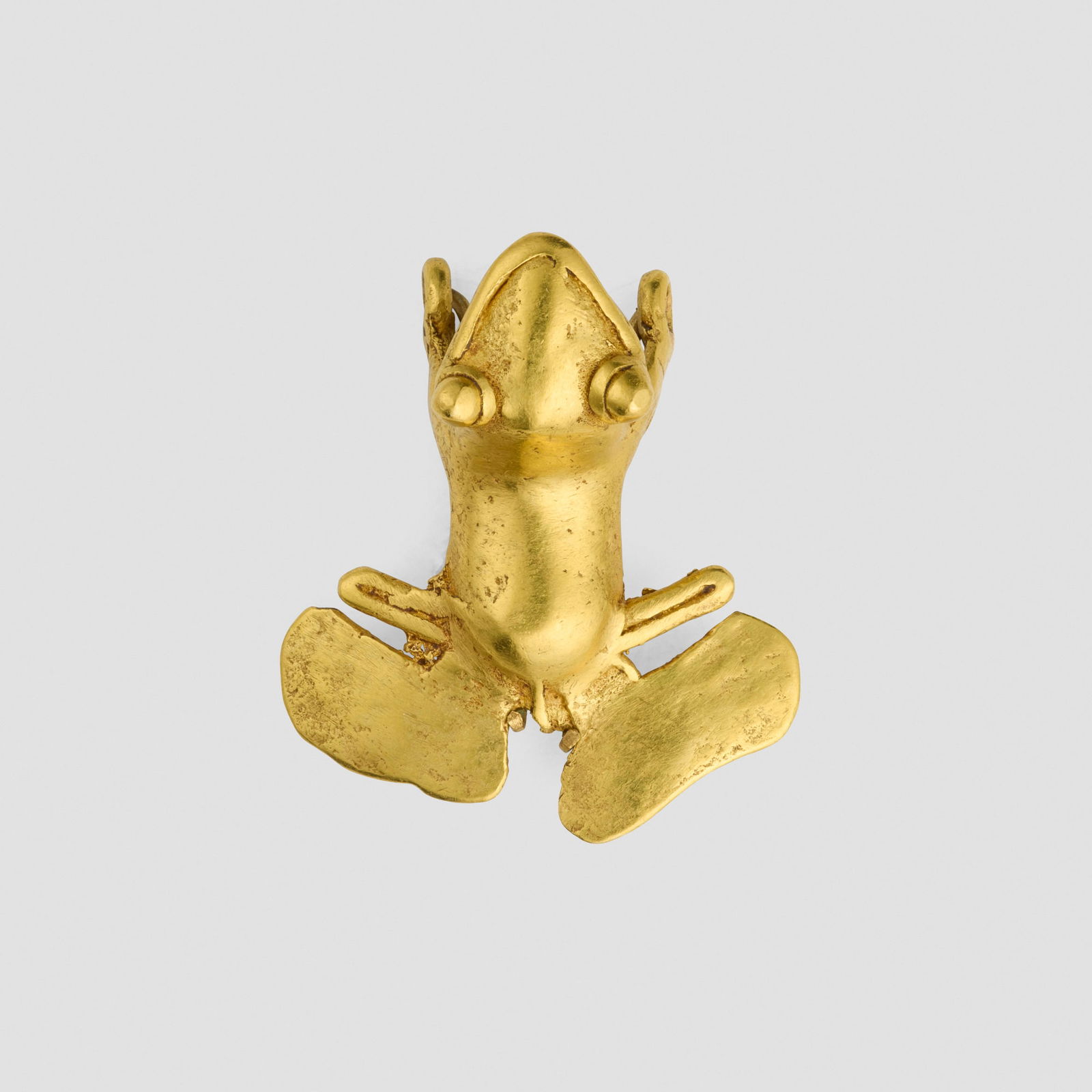 Veraguas, Frog pendant: Veraguas Frog pendant Panama, 800-1500 CE 14K gold 1.75 h x 1.5 w x 0.75 d in (4 x 4 x 2 cm) This work will ship from Lambertville, New Jersey.