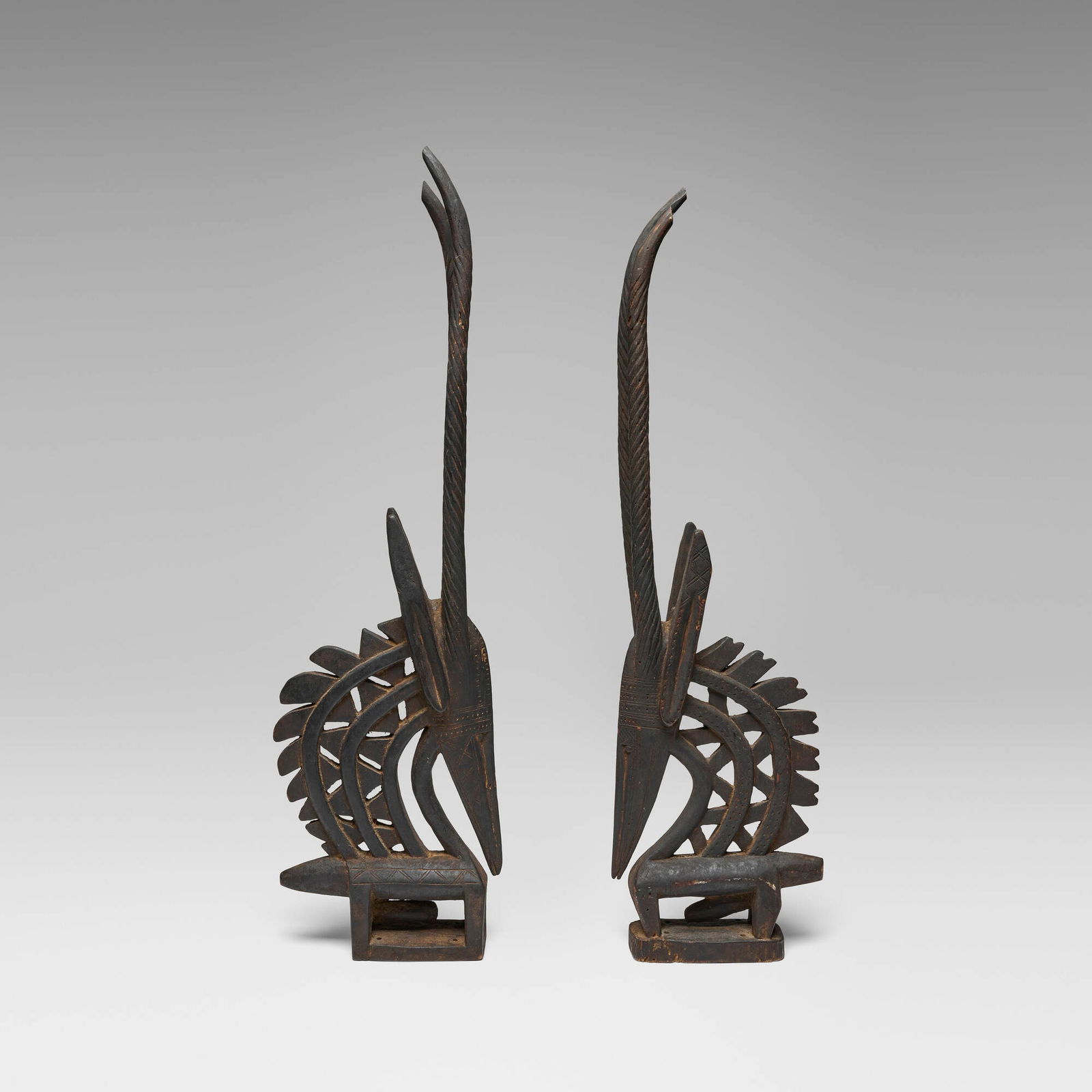 Bamana, Chi Wara (antelope headdresses), pair: Bamana Chi Wara (antelope headdresses), pair Mali, 20th century carved wood 38 h x 11 w x 3.5 d in (97 x 28 x 9 cm) This work will ship from Chicago, Illinois.