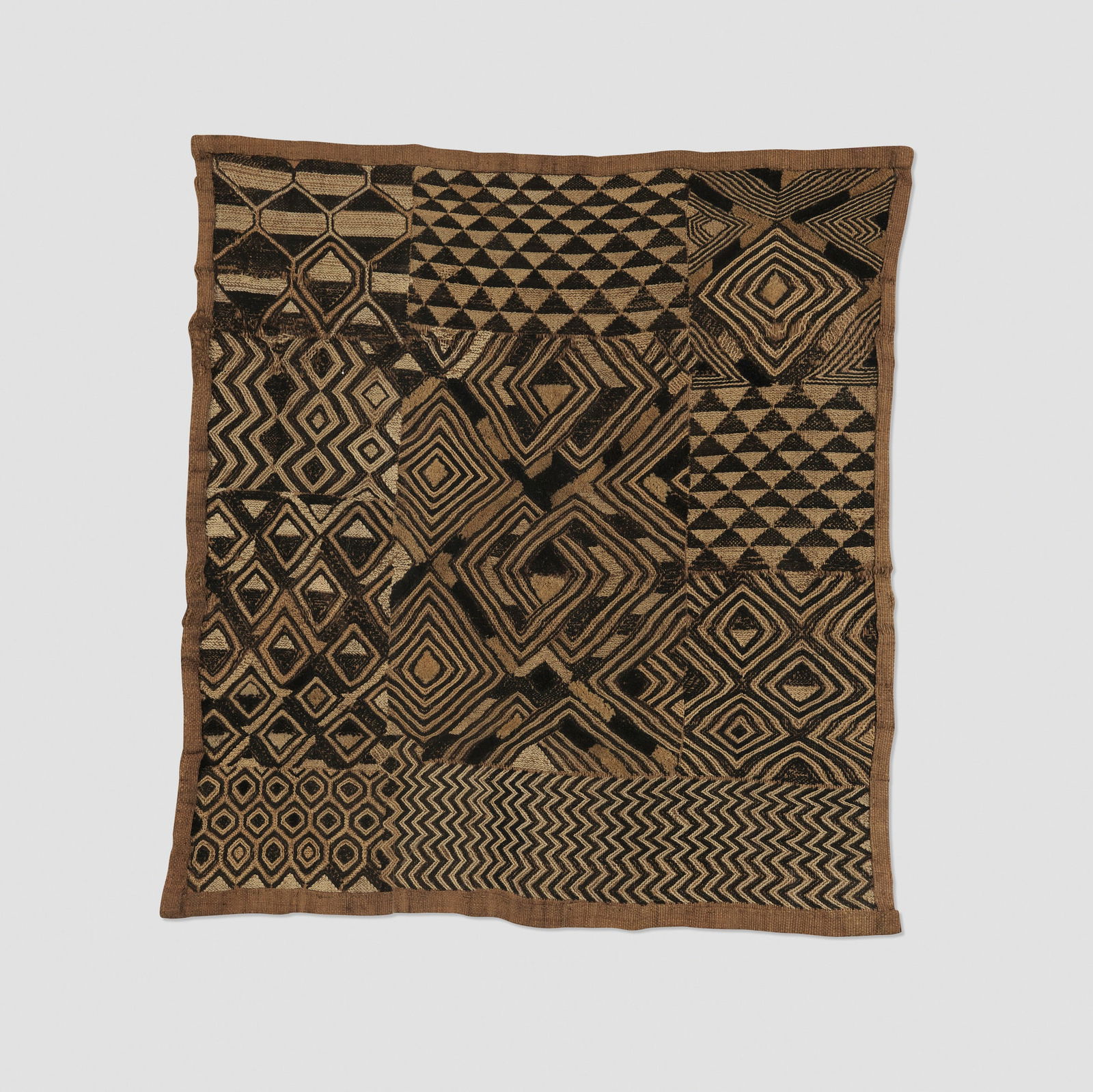Kuba, Shoowa prestige panel: Kuba Shoowa prestige panel Democratic Republic of the Congo, 20th centuryraffia, fibers 17 h x 19 w in (43 x 48 cm) Provenance: Collection of Robert and Lisa Kessler