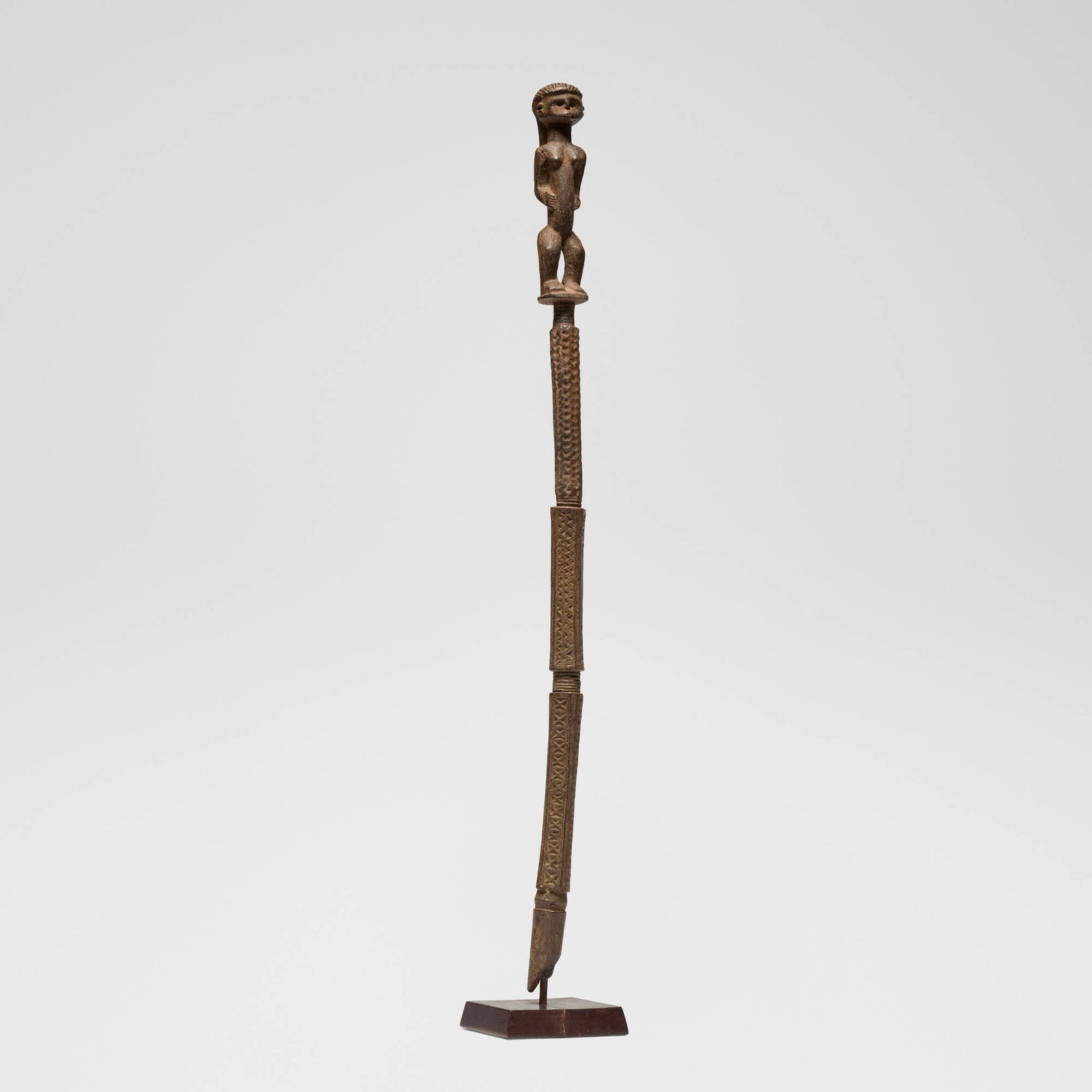 Kwere, Prestige staff: Kwere Prestige staff Tanzania, early 20th century carved wood 29.75 h x 1.75 dia in (76 x 4 cm) Provenance: Jean-Pierre Hallet, Malibu | Private Collection, Los Angeles This work will ship from