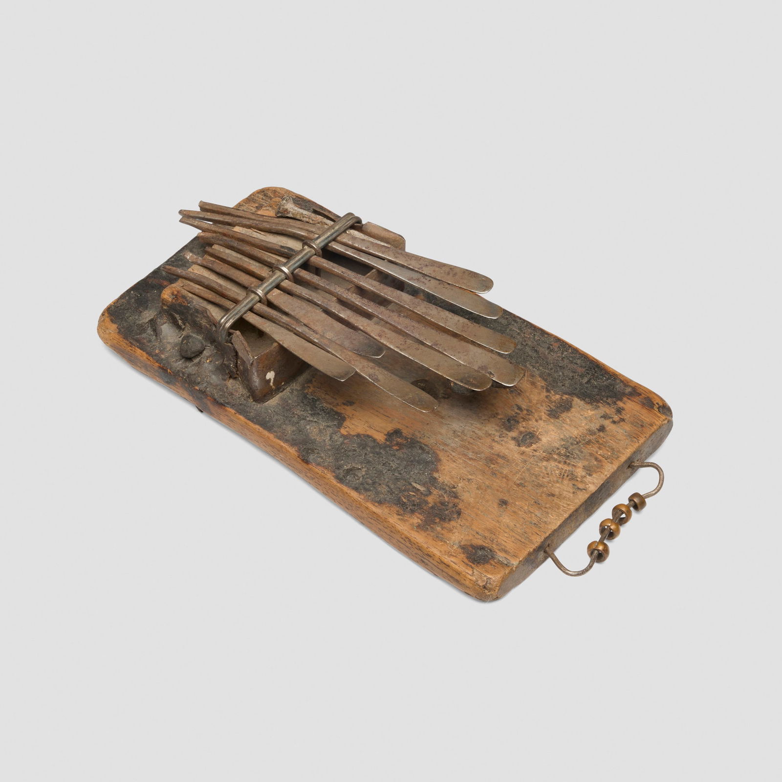 Tswana, Sanza (thumb piano): Tswana Sanza (thumb piano) Botswana, 20th century wood, iron 8.5 h x 4.75 w x 1.5 d in (22 x 12 x 4 cm) This work will ship from Lambertville, New Jersey.