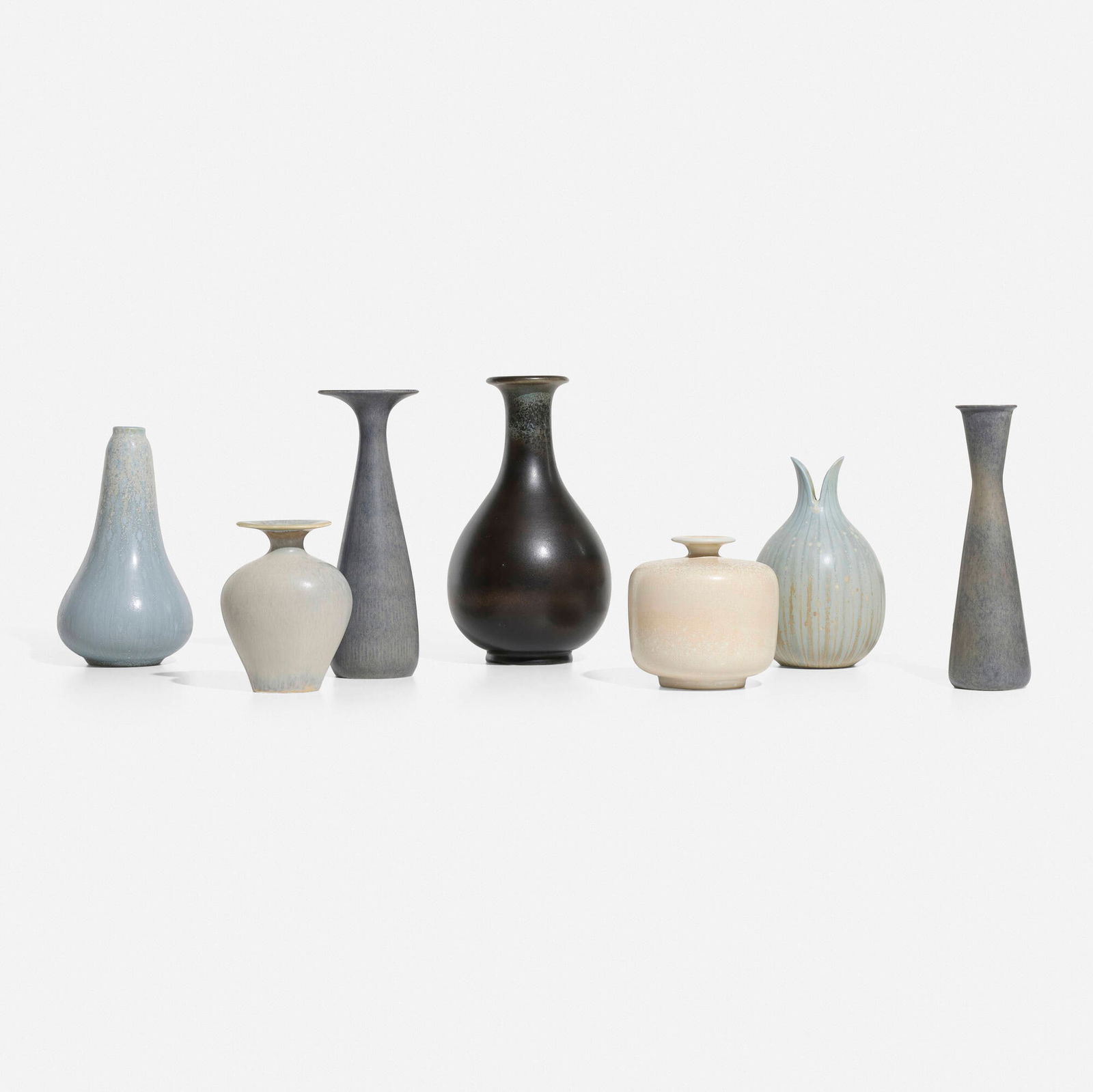 Gunnar Nylund, Collection of seven vases: Gunnar Nylund Collection of seven vases RorstrandSweden, c. 1955glazed stoneware largest: 9.5 h x 5 dia in (24 x 13 cm) smallest: 4.5 h x 4.25 dia in (11 x 11 cm) Incised manufacturer